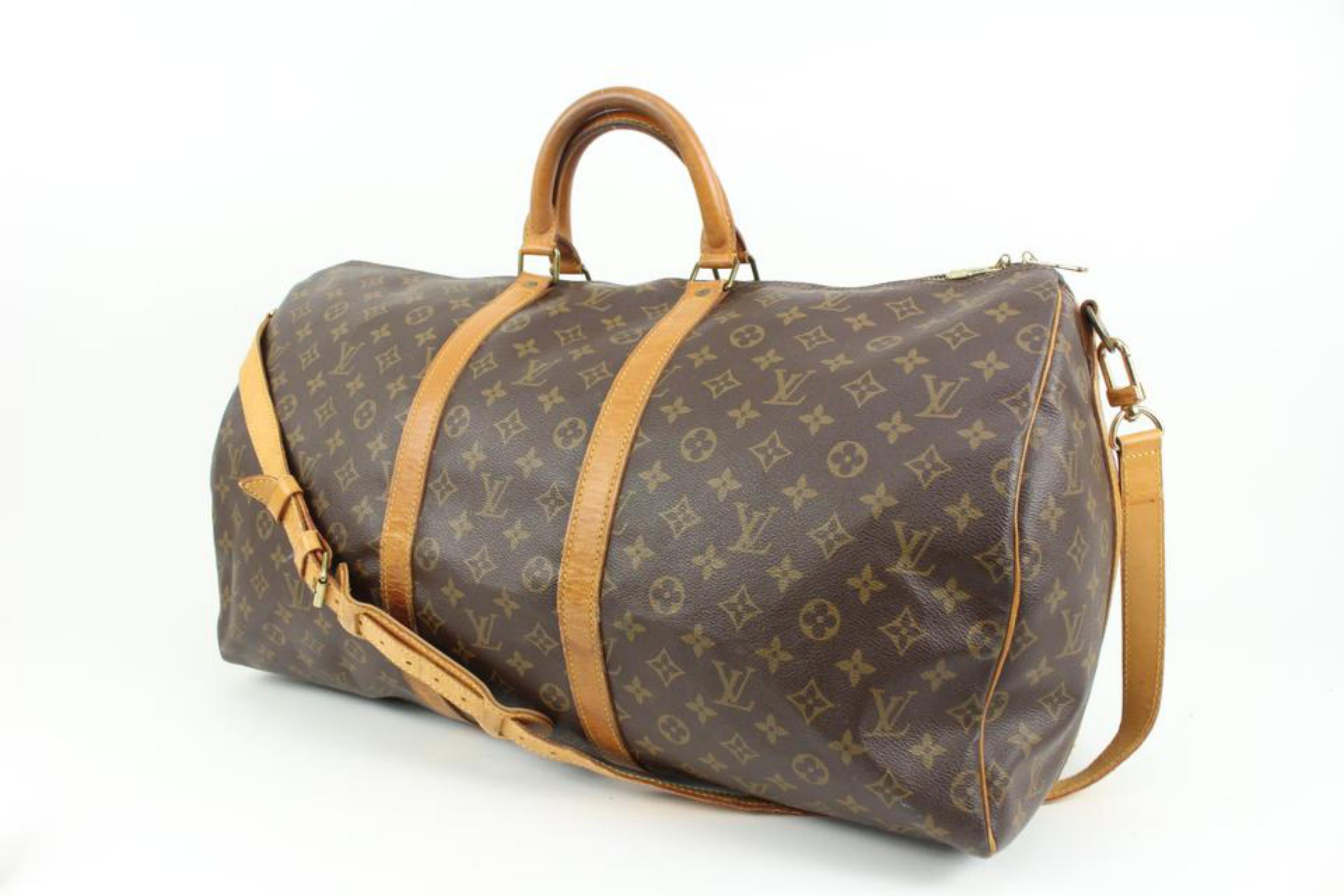 Louis Vuitton Monogram Keepall Bandouliere 55 Duffle Bag with Strap 83lk411s
Date Code/Serial Number: FH8911
Measurements: Length:  22