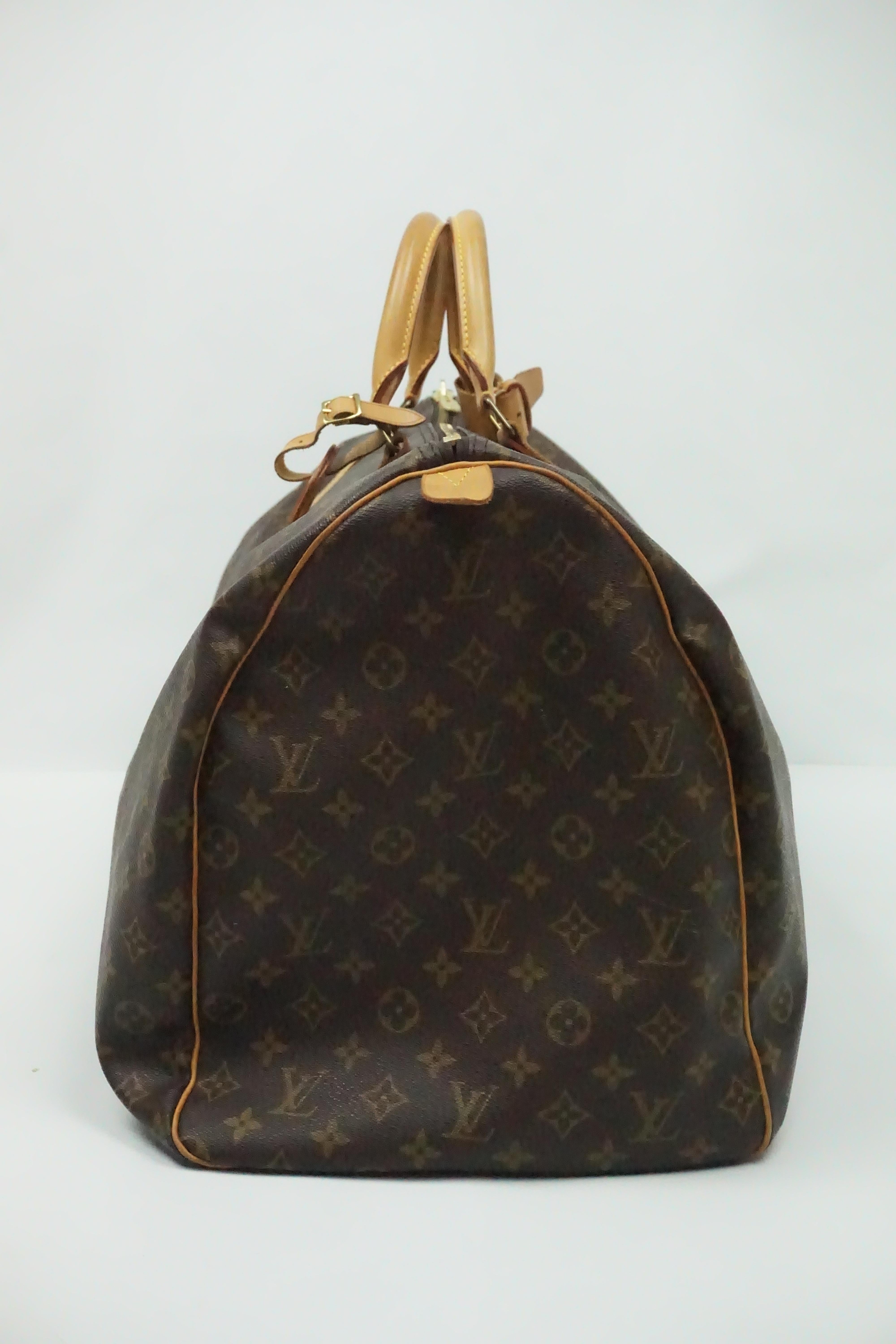 Louis Vuitton Monogram Keepall Duffel Luggage   This beautiful duffel bag is in good condition. This bag has been used before, however, it still looks like there is little to no wear on it. The duffel has two handles with a luggage tag attached. The