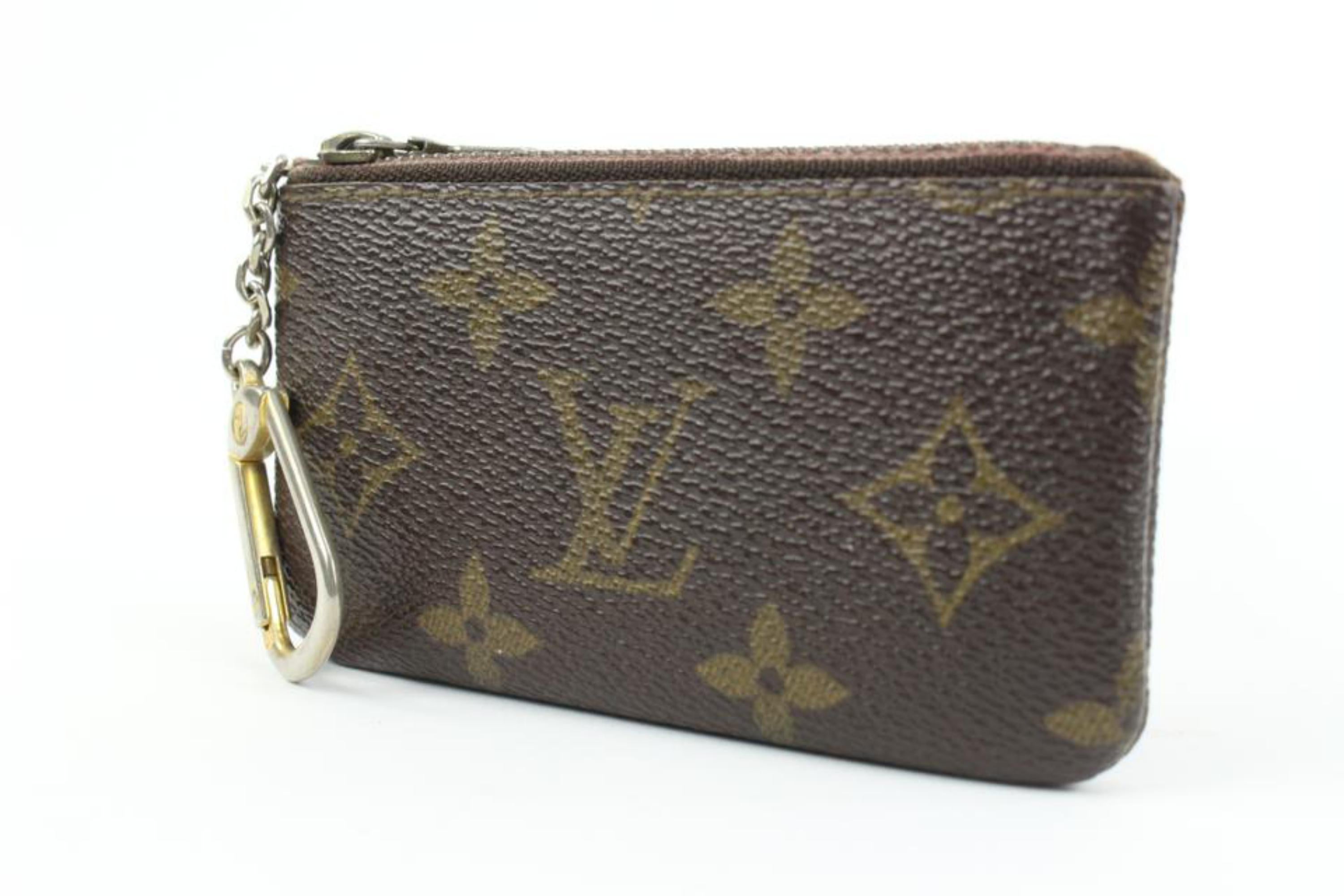 Louis Vuitton Monogram Key Pouch Pochette Cles 71lv32s
Date Code/Serial Number: 854
Made In: France
Measurements: Length:  4.5
