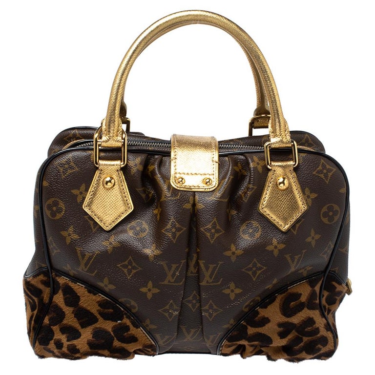 This amazing Adele bag from Louis Vuitton is gorgeous. The beauty is crafted from monogram canvas and flaunts a unique and distinctive style with leopard-printed calfhair panels, and Karung trims. It features gold-tone studs at the bottom, push-lock