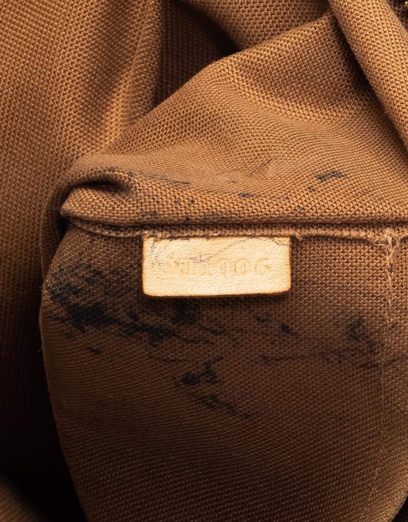 Louis Vuitton - Sac fourre-tout horizontal Lockit avec monogramme Pour femmes en vente