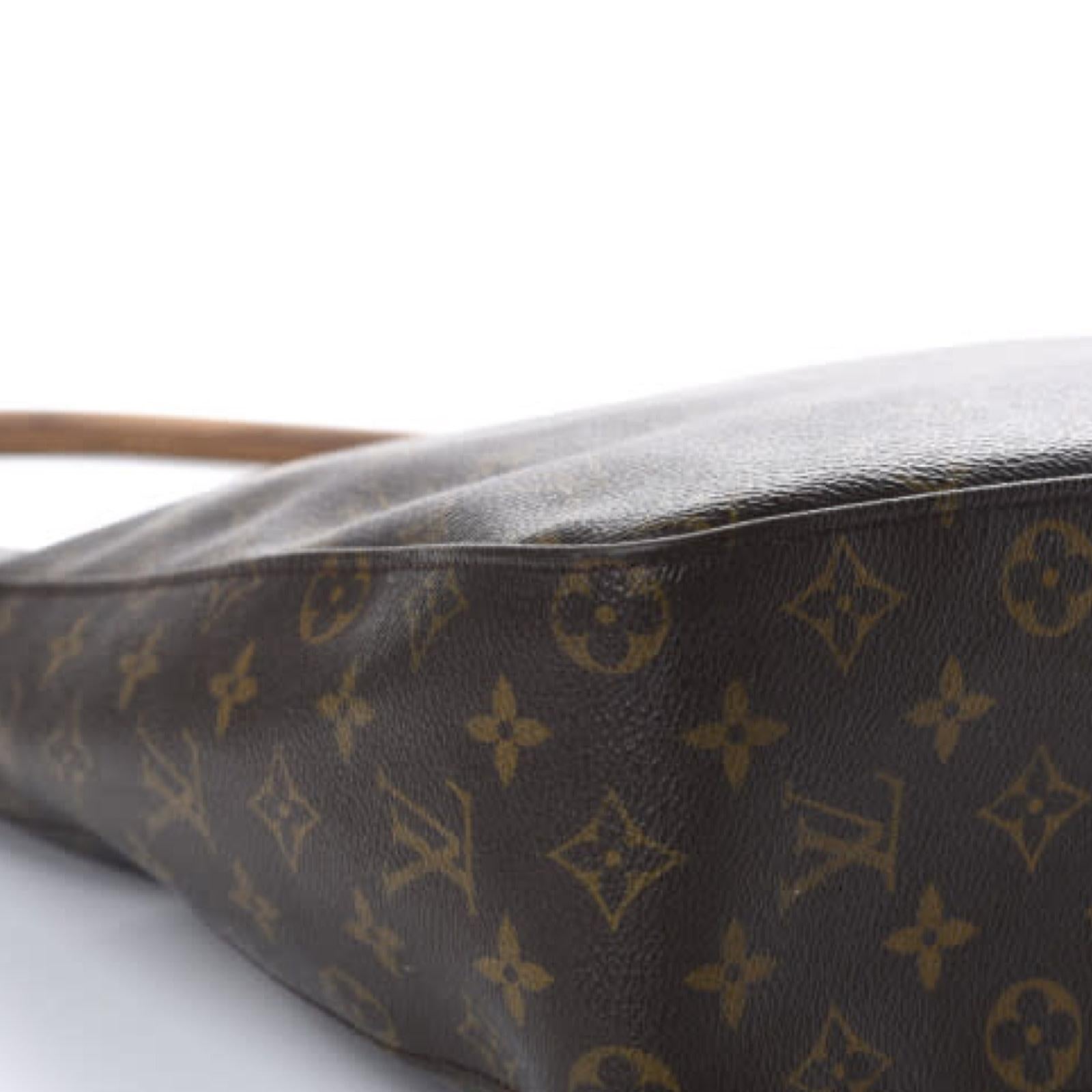 This stylish shoulder bag is crafted of signature Louis Vuitton monogram coated canvas. It features vachetta cowhide leather finishes.

COLOR: Brown
MATERIAL: Coated canvas
MEASURES: H 12.25” x L 12” x D 4”
DROP: 10”
EST. RETAIL: $2000
CONDITION: