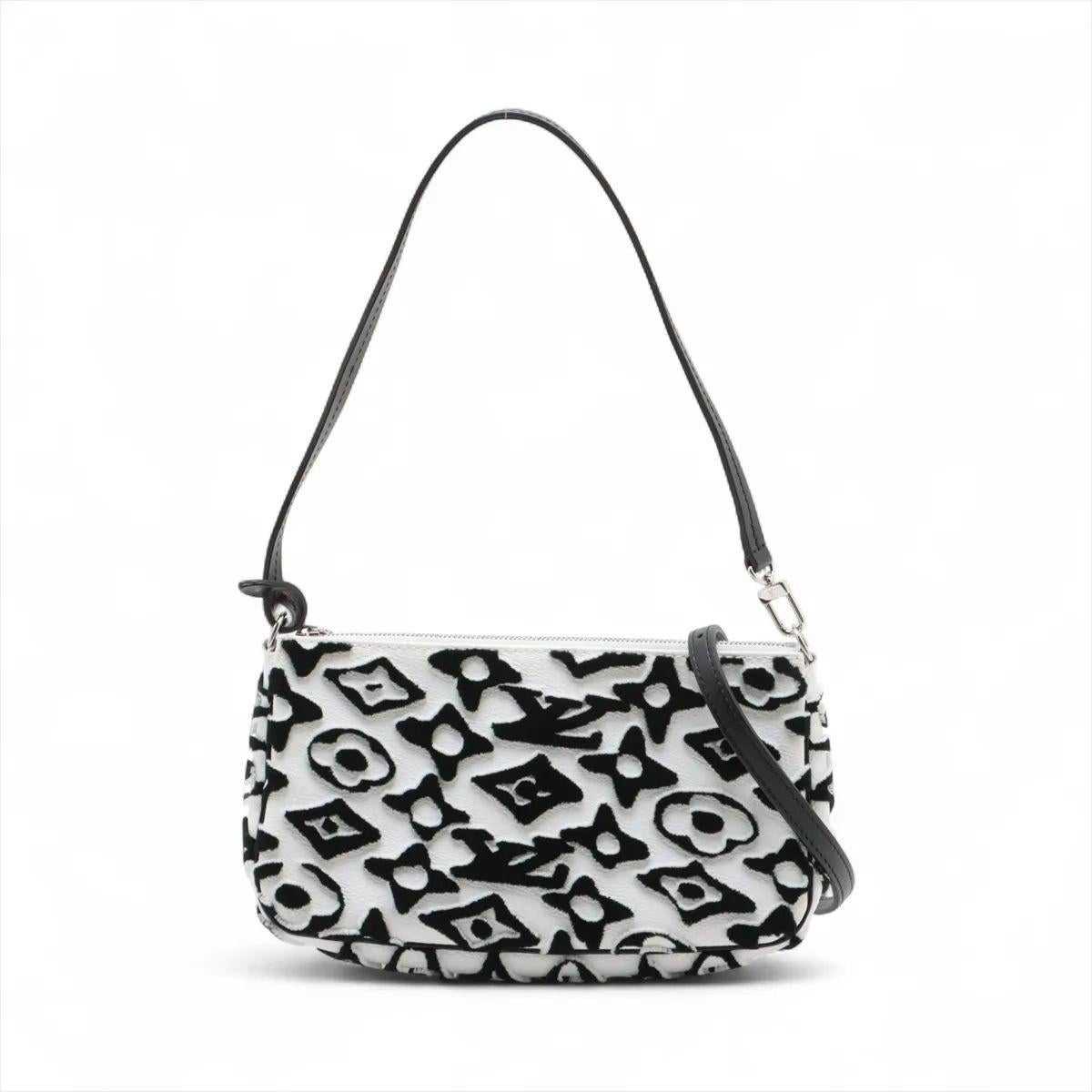 The Louis Vuitton Monogram LV x UF Pochette Accessoires in black and white is a bold reinterpretation of a classic piece, created in collaboration with Swiss artist Urs Fischer. Crafted from Monogram canvas with a striking hand-drawn effect in