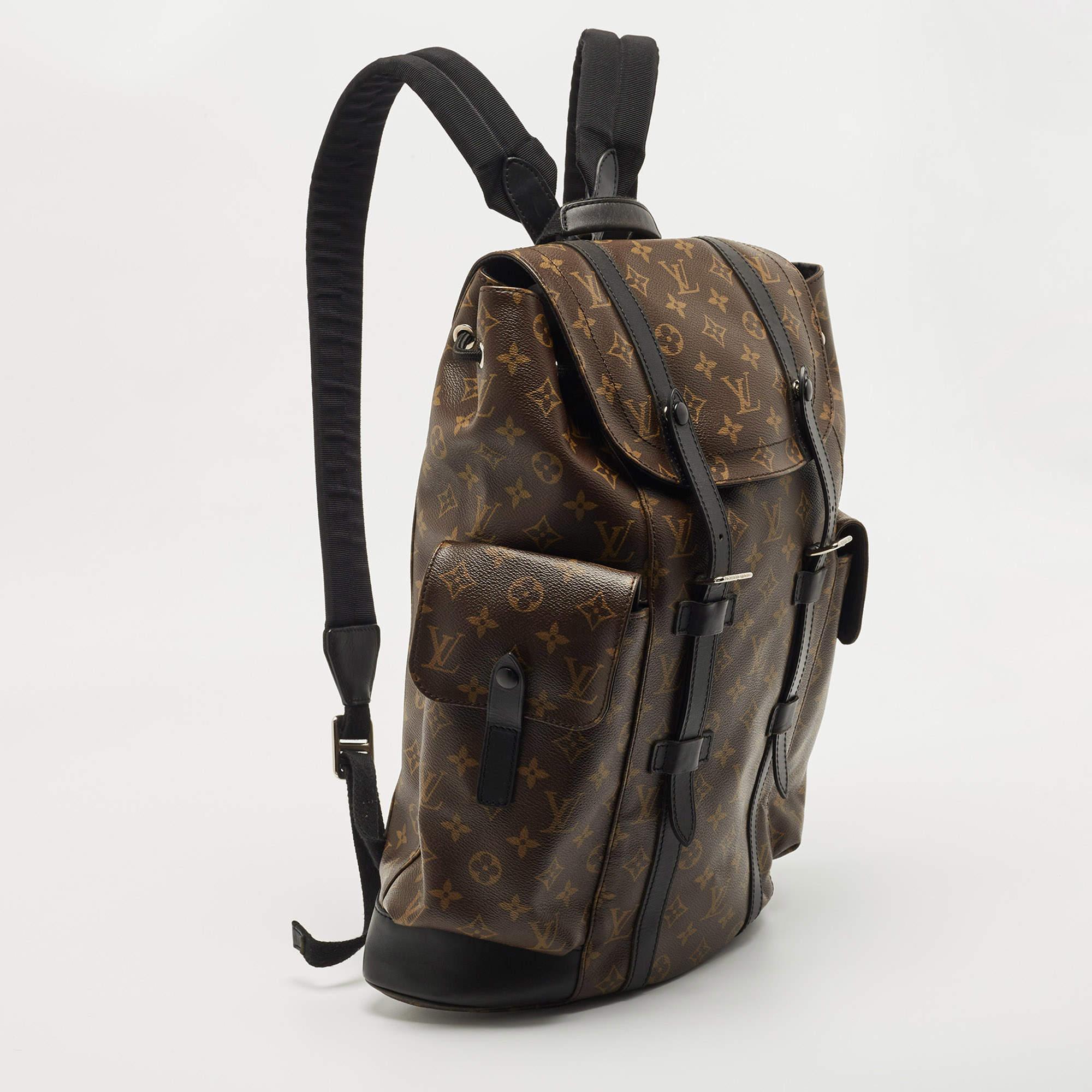 The Christopher MM backpack from Louis Vuitton is an on-point travel bag. This stylish creation is crafted from Monogram canvas and detailed with leather trims and silver-tone hardware. It has exterior pockets, comfortable handles, and a canvas