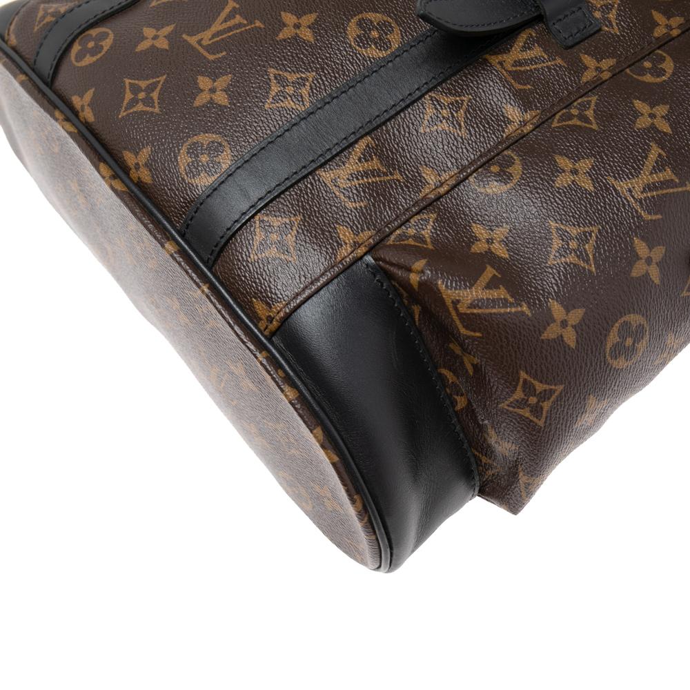 The Christopher PM backpack from Louis Vuitton is an on-point travel bag. This stylish creation is crafted from monogram canvas and detailed with leather trims and silver-tone hardware. It has exterior pockets, comfortable handles, and a canvas