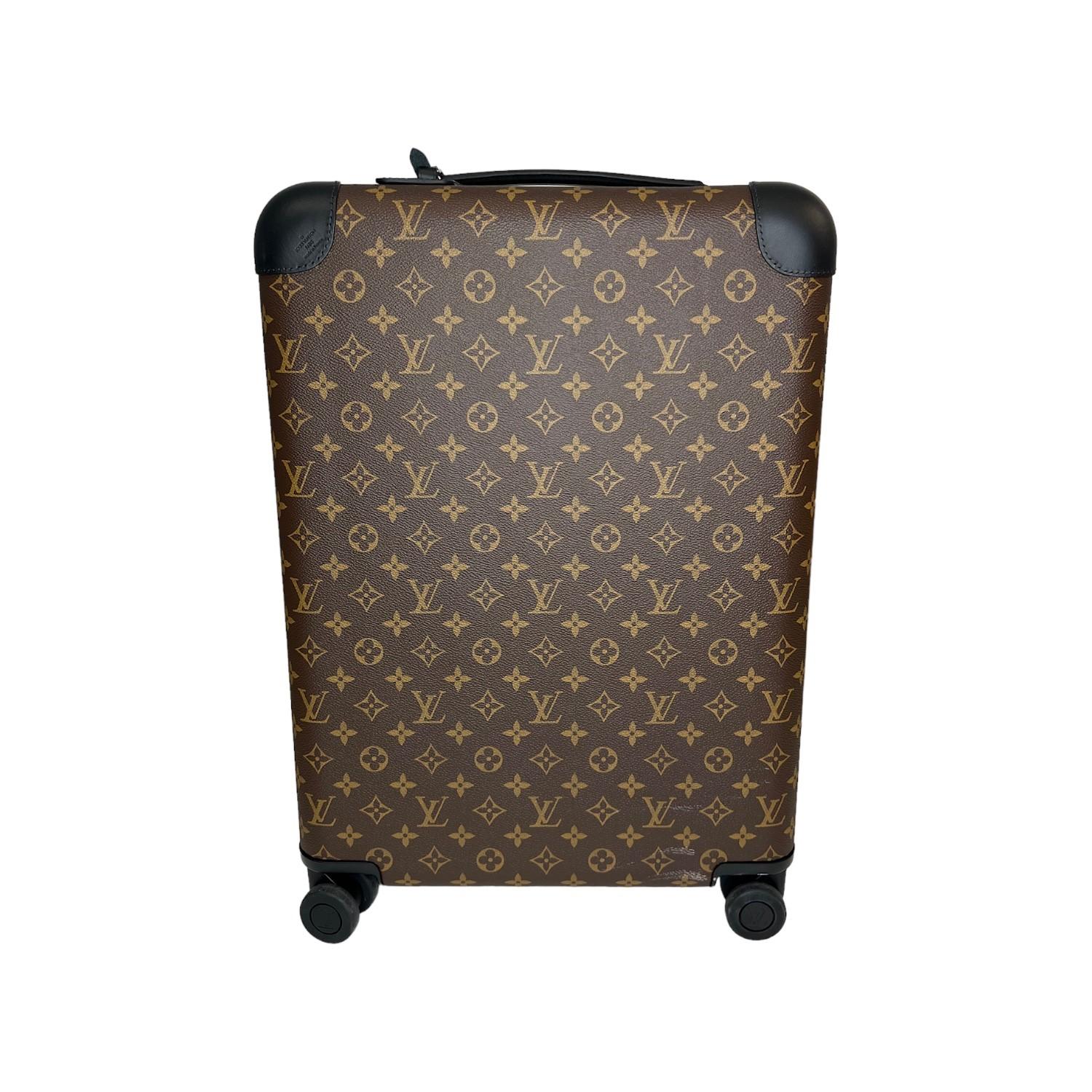 This Louis Vuitton Macassar Horizon 55 was made in France and it is finely crafted the classic Louis Vuitton Monogram coated canvas exterior with leather trimming and silver-tone hardware features. It has a locking zipper closure system that opens