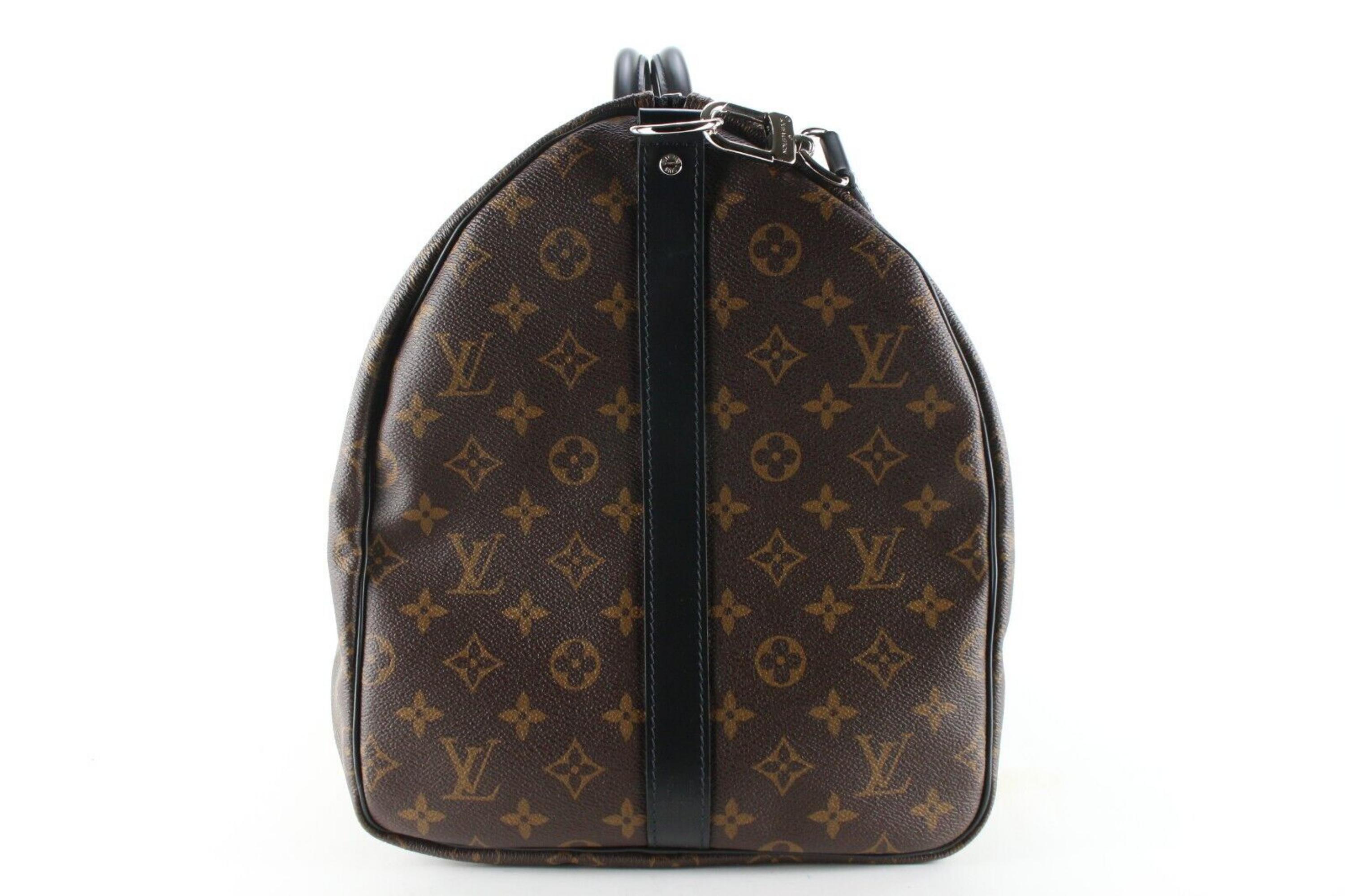 Louis Vuitton Monogram Macassar Keepall Bandouliere 55 Duffle with Strap 1LK1229
Date Code/Serial Number: AA3270

Made In: Made in France

Measurements: Length: 22 