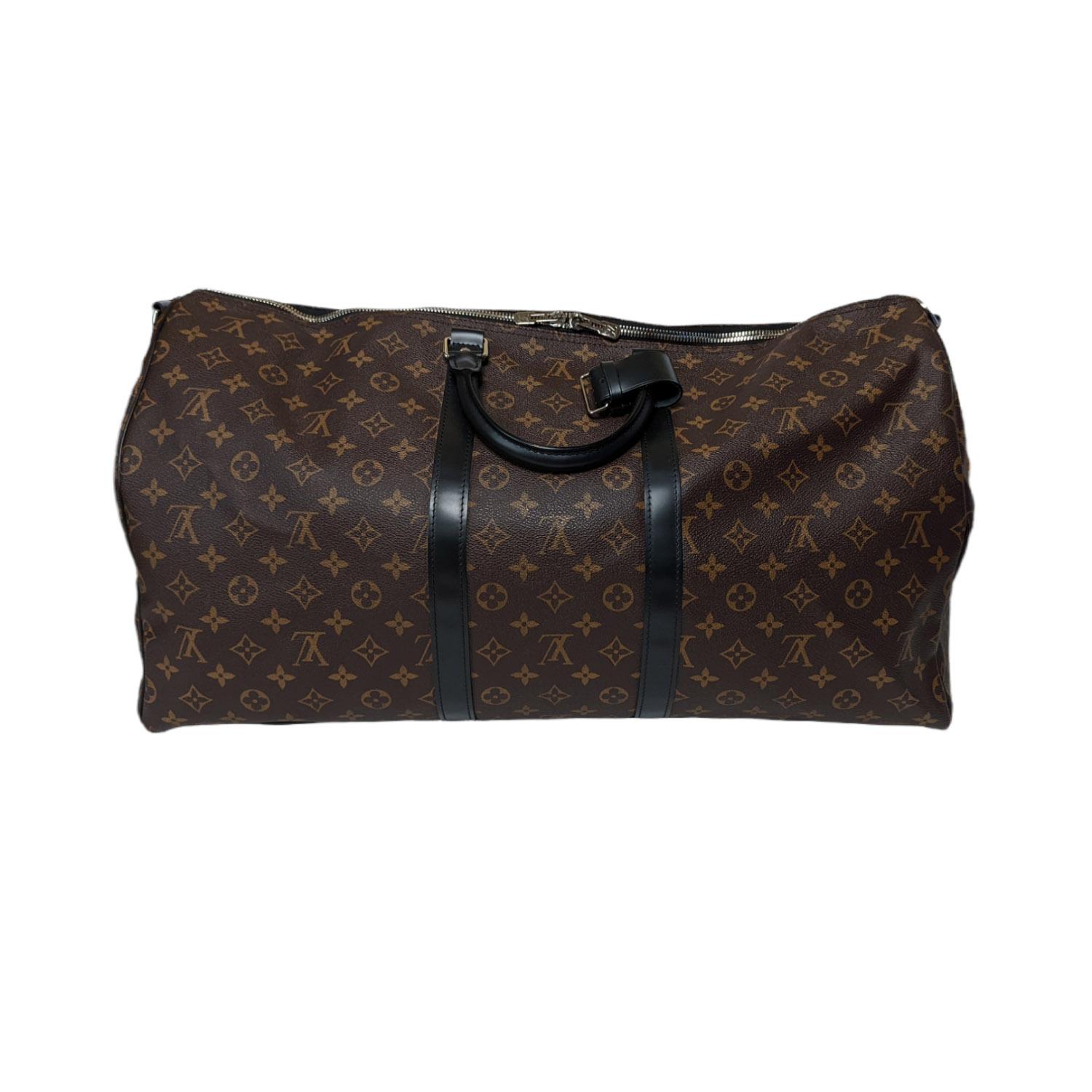 Spacious and flexible. Durable and dependable. Stylish and sophisticated. With its secure double zip and padlock, this is the perfect bag for business or pleasure. Retail $2,570.

Designer: Louis Vuitton
Material: Monogram Macassar coated-canvas and