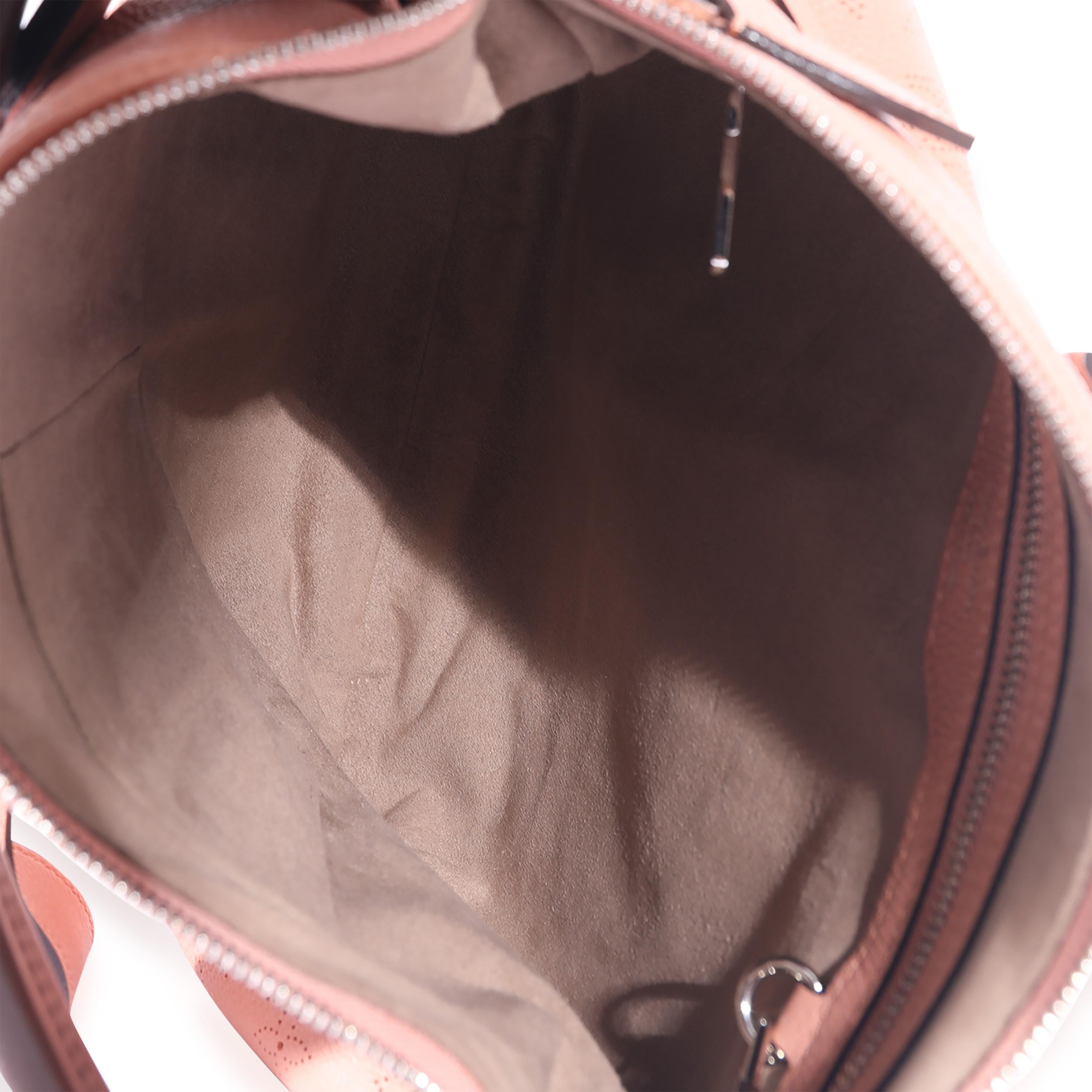 Listing Title: Louis Vuitton Monogram Mahina Selene PM
SKU: 127213
Condition: Pre-owned 
Handbag Condition: Very Good
Condition Comments: Item is in very good condition with minor signs of wear. Scuffing at straps. Exterior light corner scuffing.