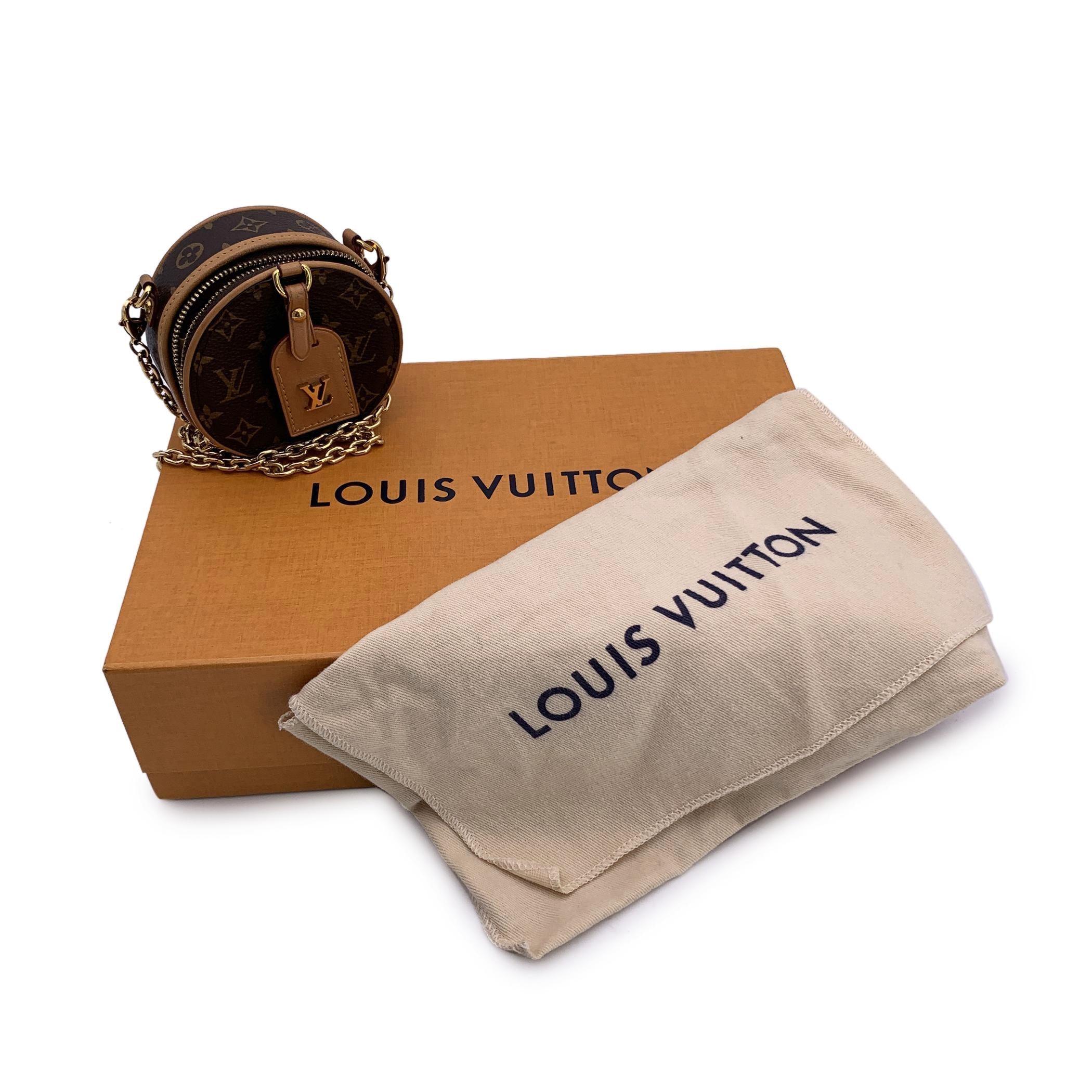 Louis Vuitton Mini Boîte Chapeau crossbody bag or necklace. A versatile accessory that adds a refined sparkle to any look, can be used as a crossbody bag or as a necklace. Crafted in Monogram canvas with beige leather trim. The design is inspired by