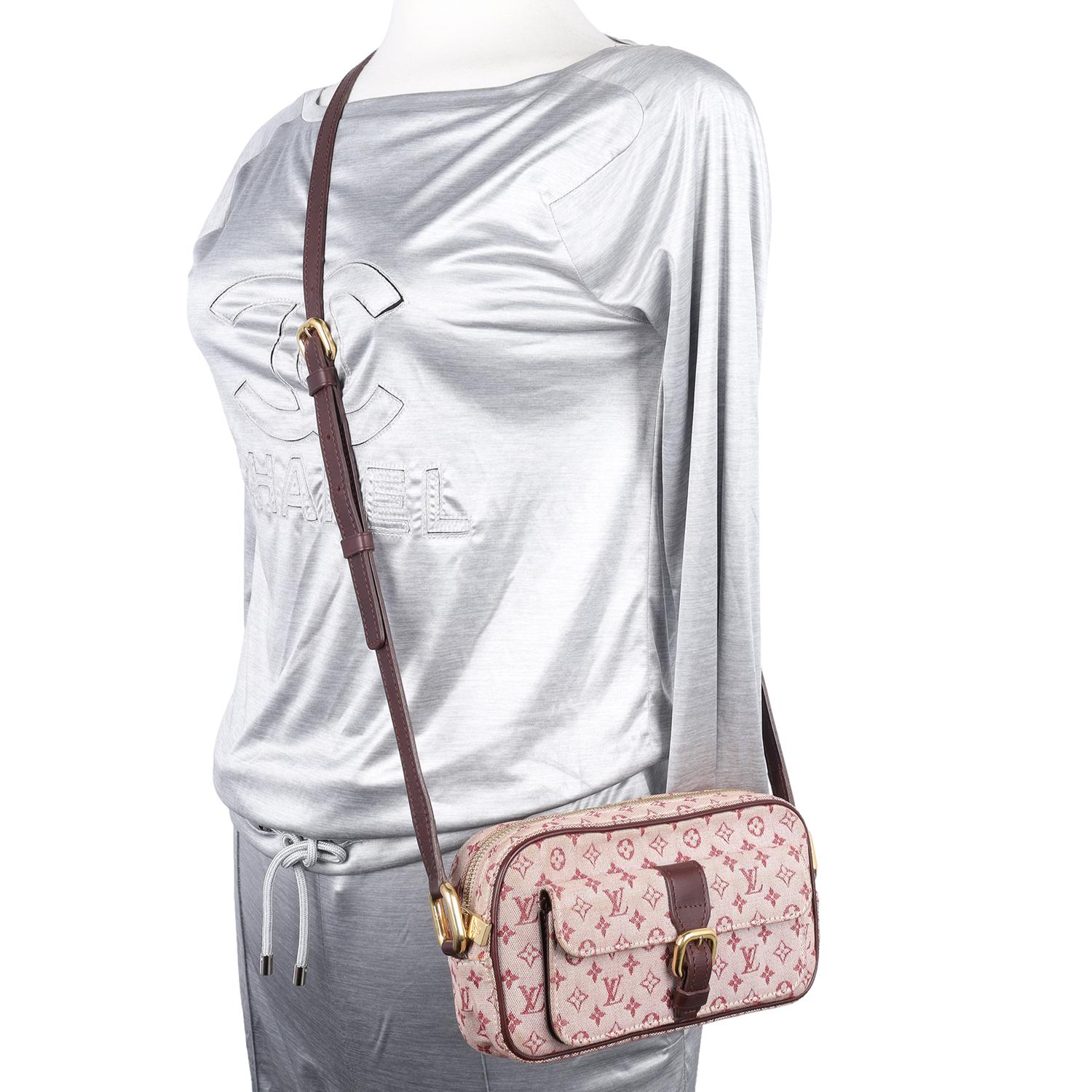 Authentic, pre-loved Louis Vuitton Mini Lin Juliette Satchel Crossbody Bag in pink. The perfect day bag to travel bag. Features mini lin monogram canvas, leather adjustable strap, zipper top closure, front slip pocket with buckle closure, beige