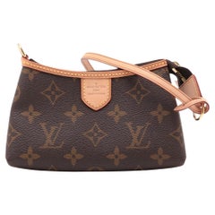 Used Louis Vuitton Monogram Mini Pochette Delightful