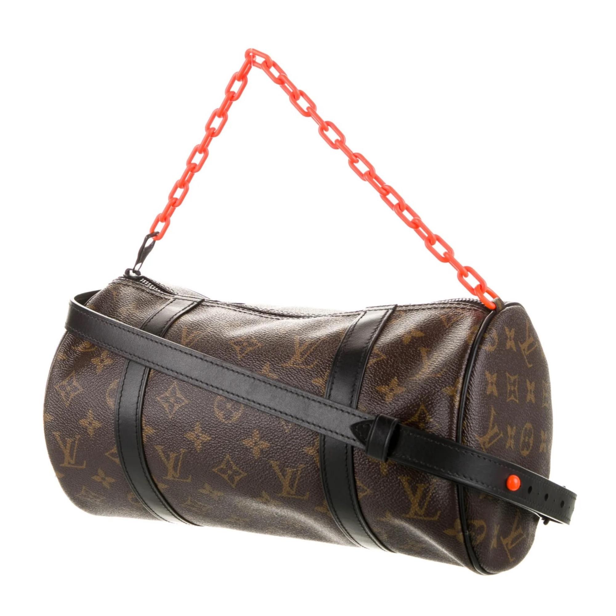 Louis Vuitton Shoulder Bag. From the 2019 Collection by Virgil Abloh. Brown Coated Canvas. LV Monogram. Tonal Hardware. Leather Trim. Chain-Link Handle & Adjustable Waist Strap. Leather Trim finishes. Canvas Lining. Zip Closure at Top.

Color: Brown