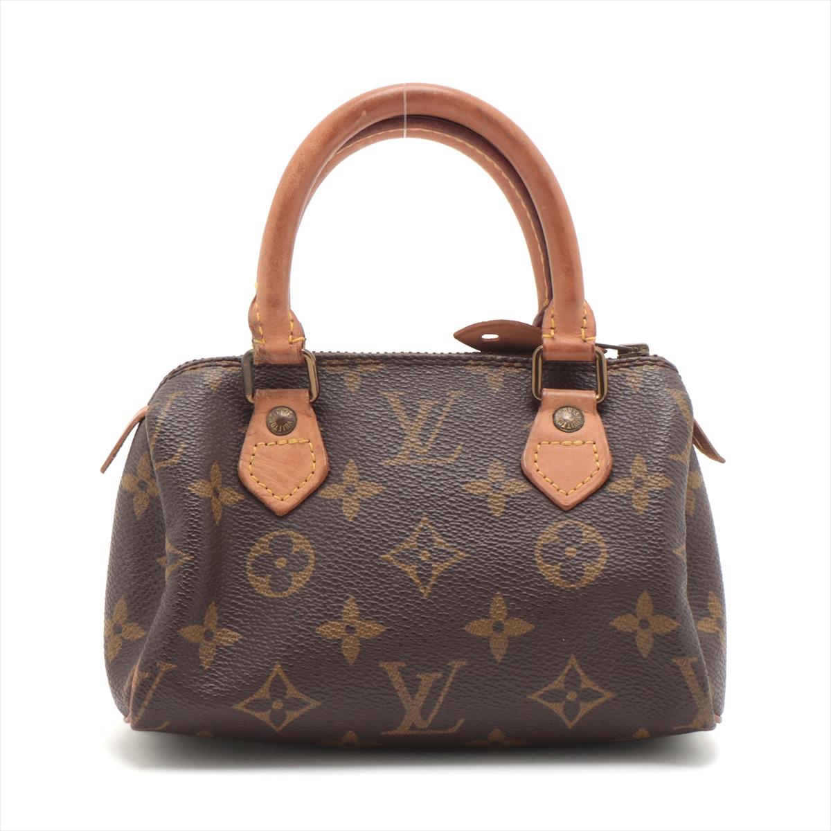 The Louis Vuitton Monogram Mini Speedy Bag is a charming and compact handbag that embodies timeless elegance and craftsmanship. Crafted from the iconic Monogram canvas, the bag features the renowned LV pattern, instantly recognizable as a symbol of