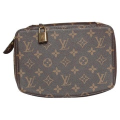 Louis Vuitton, Portagioie Monogram Monte Carlo