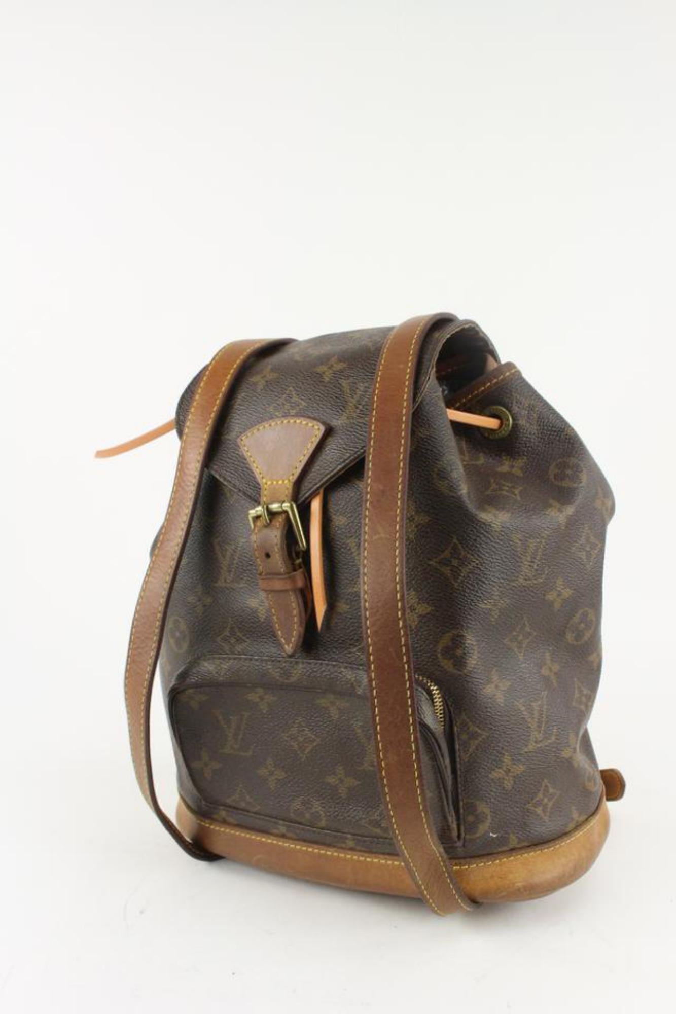 Louis Vuitton Monogram Montsouris MM Backpack 1216lv28
Date Code/Serial Number: SP0011
Made In: France
Measurements: Length:  13