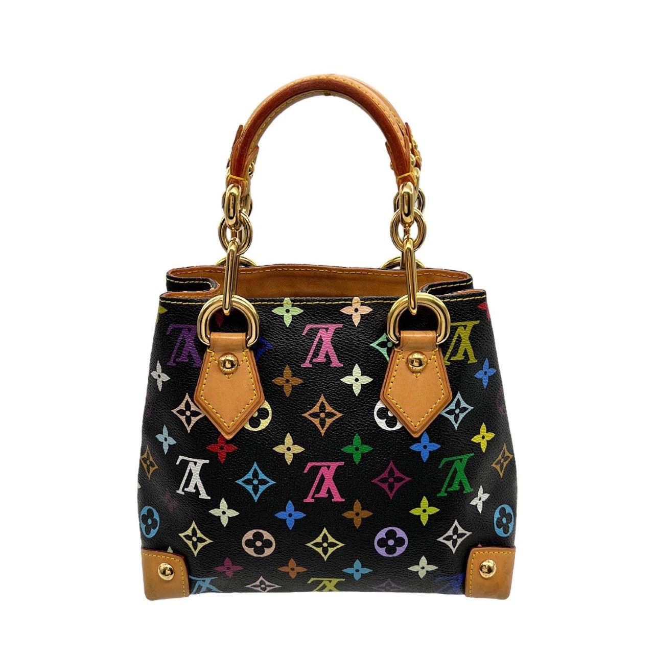 We are offering this very beautiful Louis Vuitton Audra tote. Made in France, it is finely crafted of a Louis Vuitton Black Multicolor Monogram canvas exterior with cowhide leather and gold-tone hardware features. It also has dual leather flat