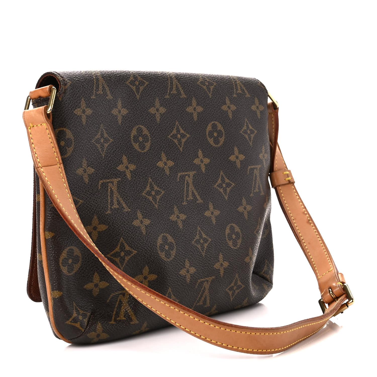 Musette Tango bag is from the 2000 collection by Marc Jacobs and is made of brown canvas with monogram pattern. Featuring a vachetta leather shoulder strap, front flap with snap and magnetic closure, terra-cotta cross grain leather on the underside