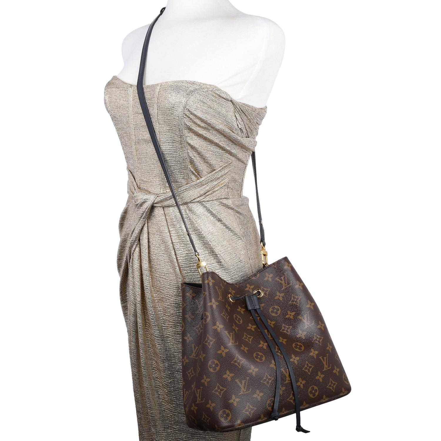 Authentic, pre-owned Louis Vuitton Monogram Canvas NéoNoé MM Crossbody bag. This bucket bag is both fashionable and practical. The bag is lightweight and can be carried on the shoulder or adjust the strap and carry it as a cross body bag. You're