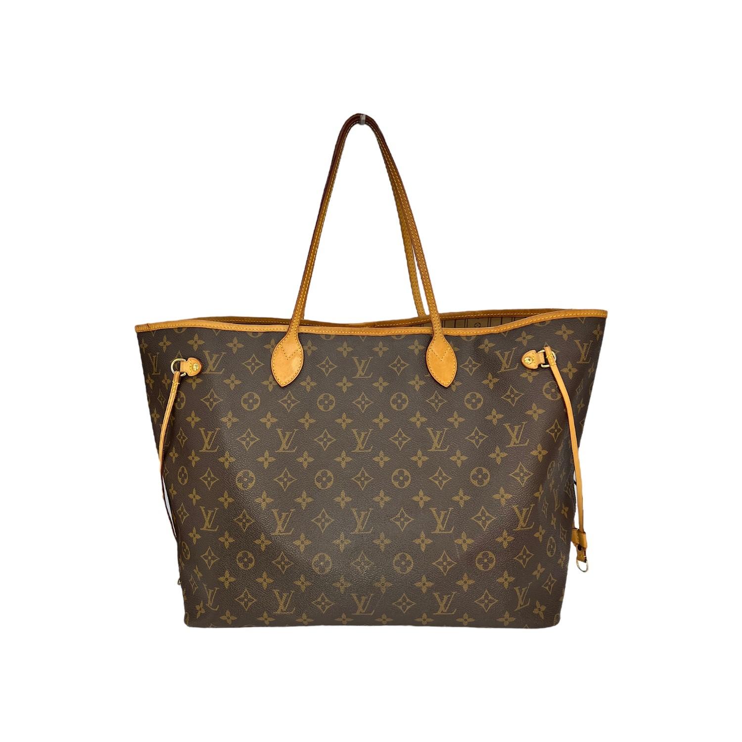 This Louis Vuitton Neverfull GM was made in France and it is finely crafted of the iconic Louis Vuitton Monogram coated canvas with leather trimming and gold-tone hardware features. It has dual flat leather shoulder straps. It has a clasp closure on