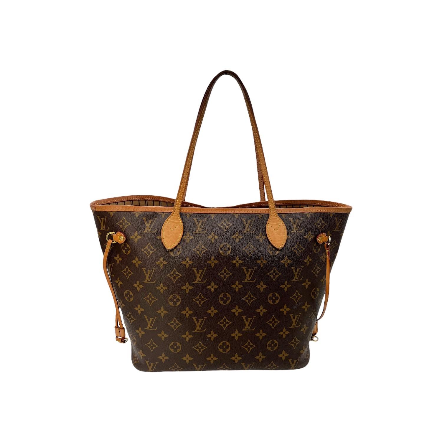 This Louis Vuitton Neverfull MM handbag was made in 2020 in France and it is crafted of the brown Louis Vuitton Monogram coated canvas with leather trimmings and gold-tone hardware features. It has dual flat leather handles and it has an open top