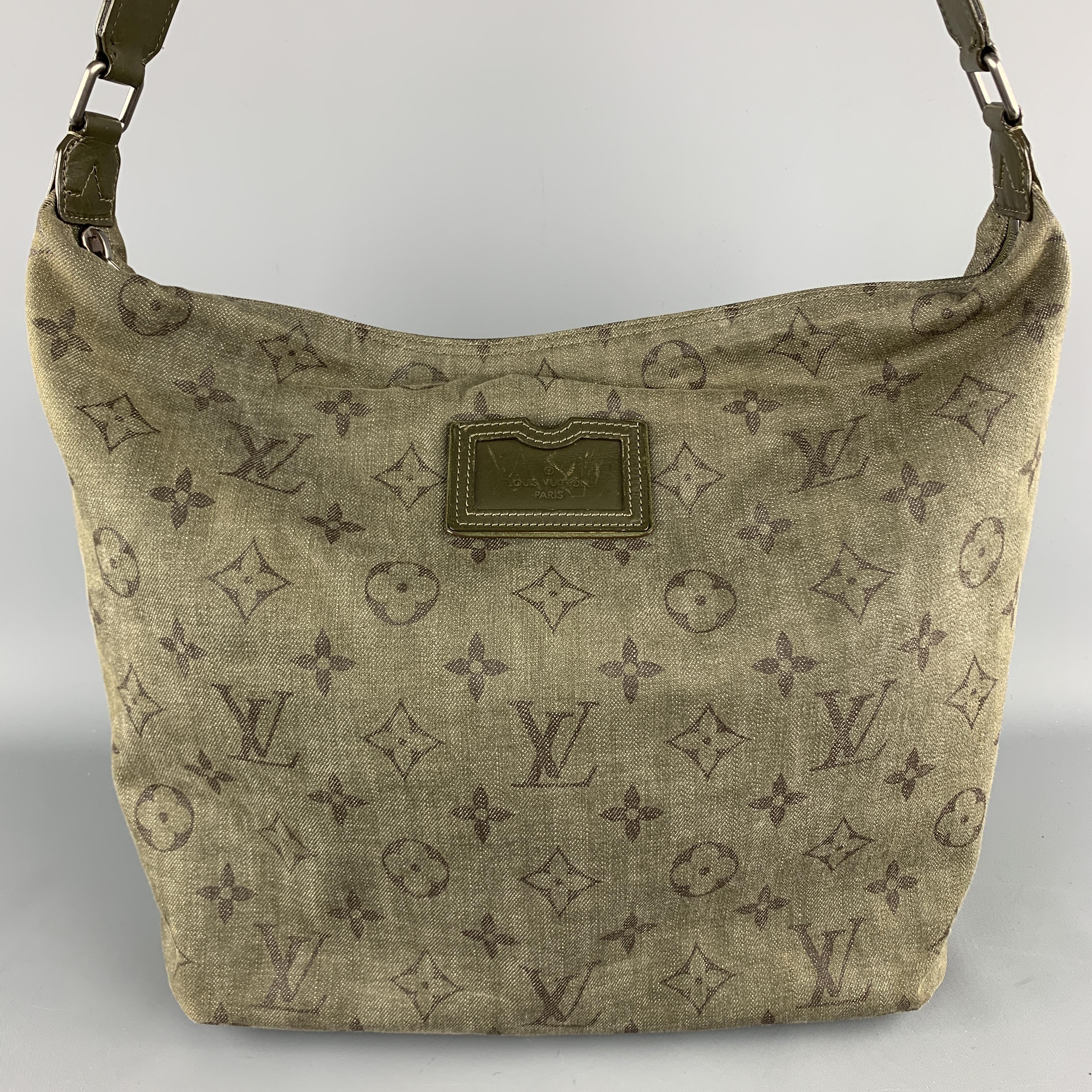 Authentic LOUIS VUITTON bag from the Spring/Summer 2011 Collection. Green monogram canvas LV Impression Besace Bag with silver-tone hardware, adjustable shoulder strap, olive green leather trim, green woven interior lining, three pockets at interior