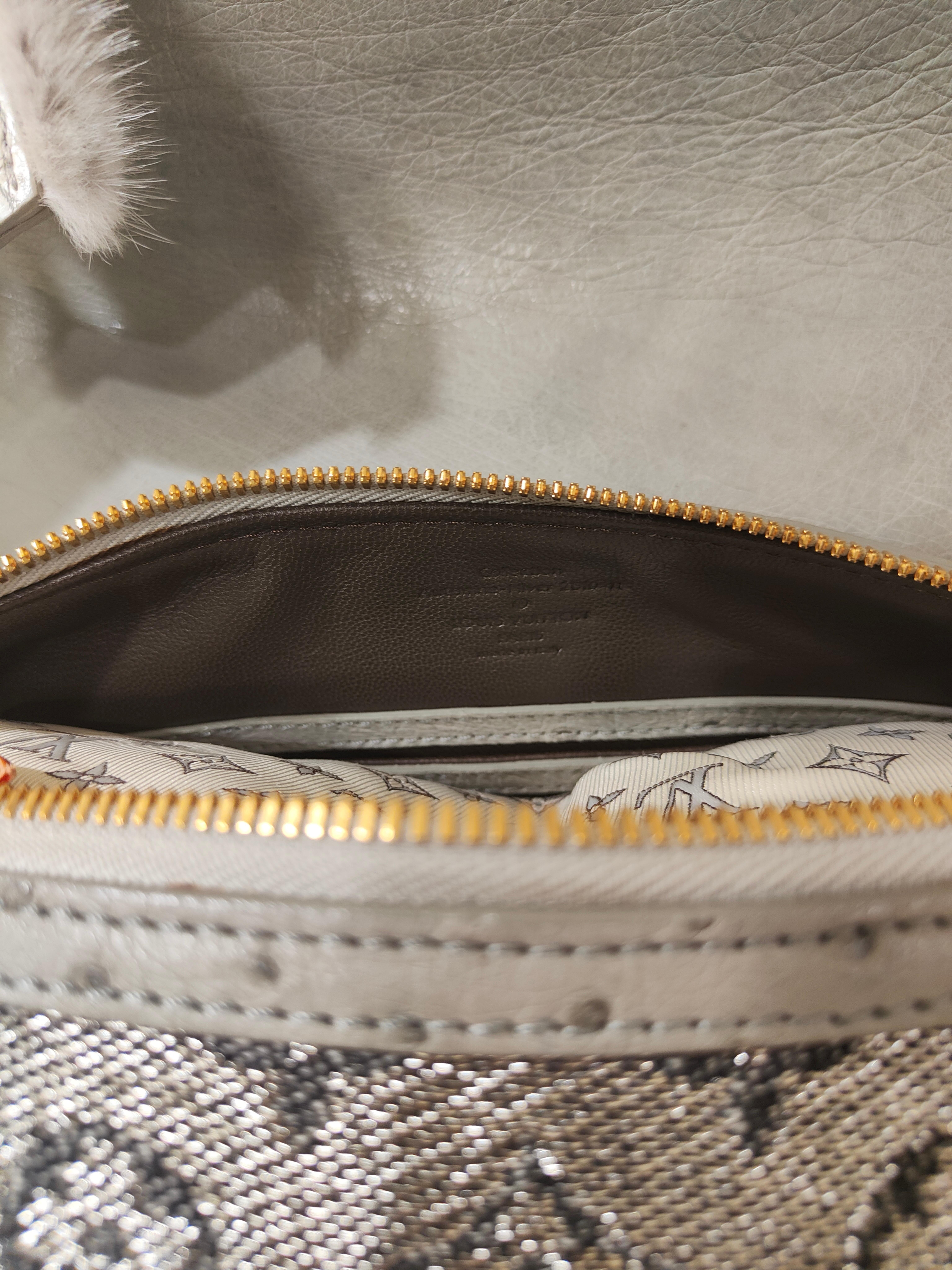 Women's or Men's Louis Vuitton Monogram Ostrich comedie carrousel handbag For Sale