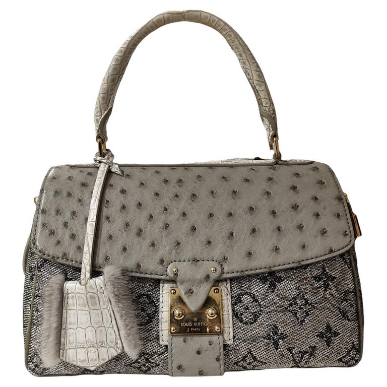 Louis Vuitton Monogram Ostrich comedie carrousel handbag For Sale at  1stDibs  louis vuitton ostrich pocket organizer, louis vuitton ostrich bag,  lv ostrich bag