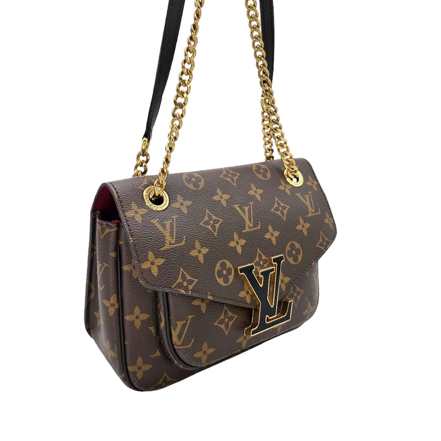 Indulge in luxury with the Louis Vuitton Monogram Passy Crossbody Bag. Crafted from durable Monogrammed coated canvas, its elegant design features a frontal LV Monogram Emblem magnetic closure. With dual shoulder straps, including one chain and one