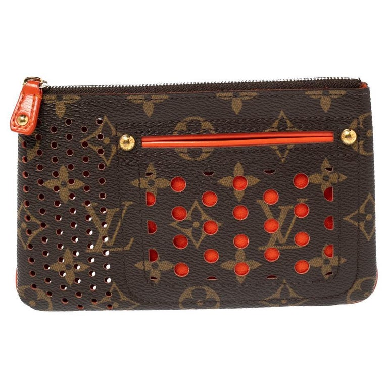 Louis Vuitton Monogram Perforated Pochette Accessories Wristlet For Sale at  1stDibs