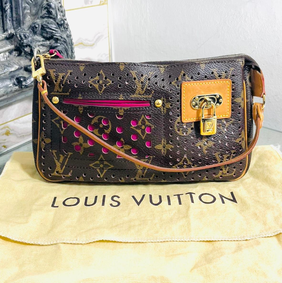 Louis Vuitton Monogram Perforated Coated Canvas Pochette Accessoires Bag

Brown shoulder bag designed with signature monogram throughout.

Detailed with perforated exterior with contrasting, bright pink Alcantara lining.

Featuring detachable,
