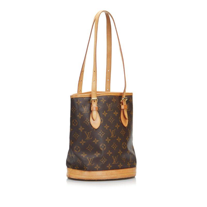 Louis Vuitton Monogram Petit Bucket Bucket Bag

This bucket bag features a monogram canvas body with vachetta leather trim, adjustable flat vachetta leather straps, an open top, and interior zip and slip pockets.

Additional