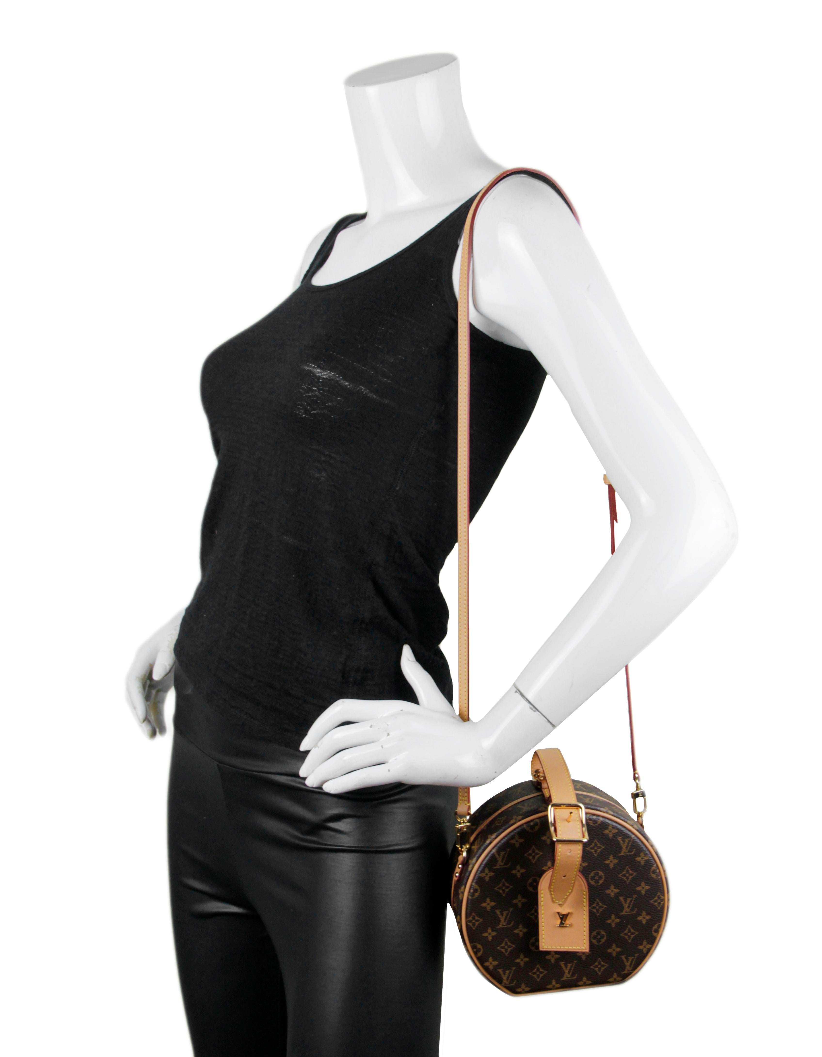 Louis Vuitton Monogram Petite Boite Chapeau Crossbody Bag

Made In: France
Color: Brown
Hardware: Goldtone
Materials: Coated canvas with vachetta leather
Lining: Beige leather
Closure/Opening: Magnetic snap closure with goldtone S lock