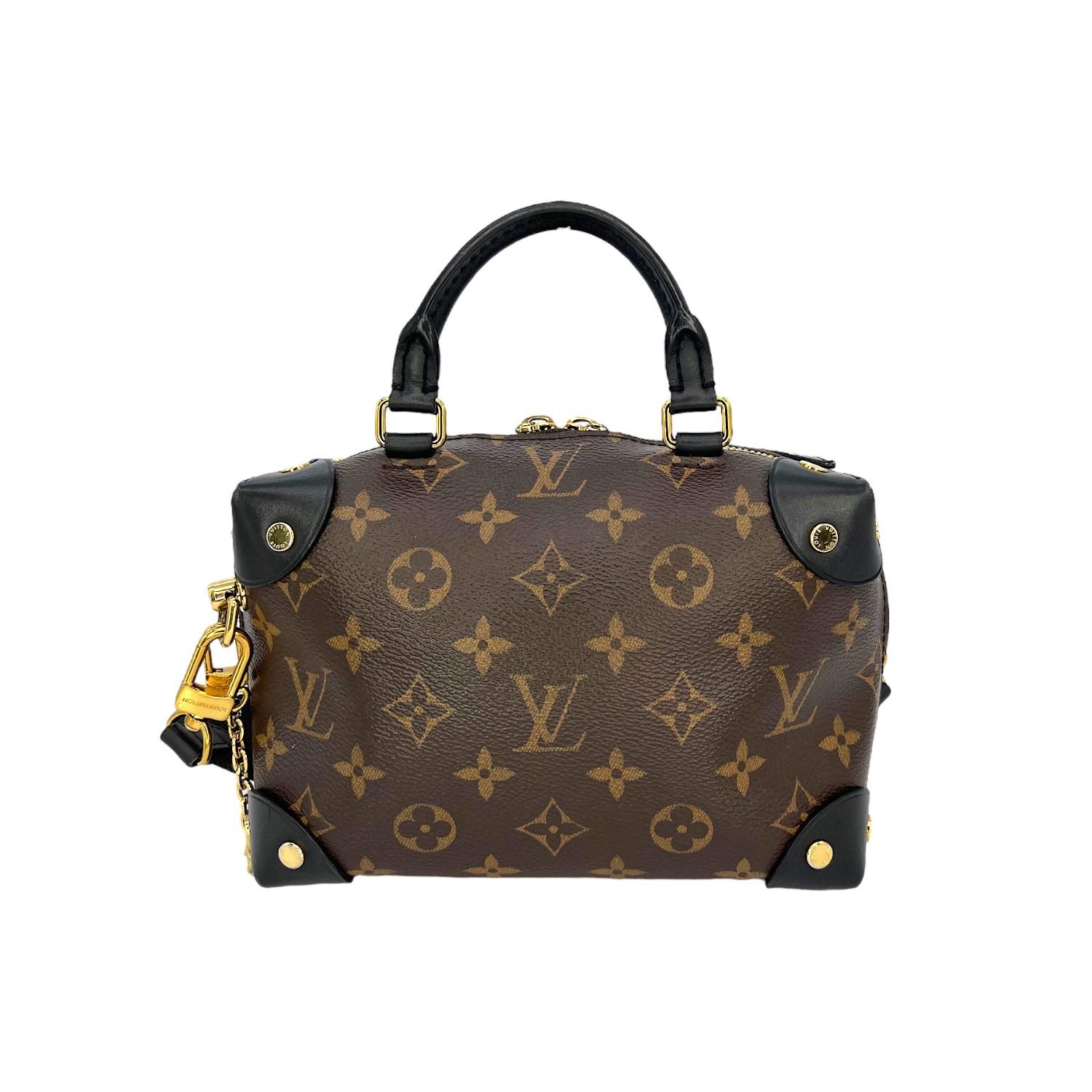 This Louis Vuitton Monogram Petite Malle Souple was made in France and it is finely crafted of the iconic Louis Vuitton Monogram coated canvas exterior with leather trimming and gold-tone hardware features. It has a rolled leather top handle. It has