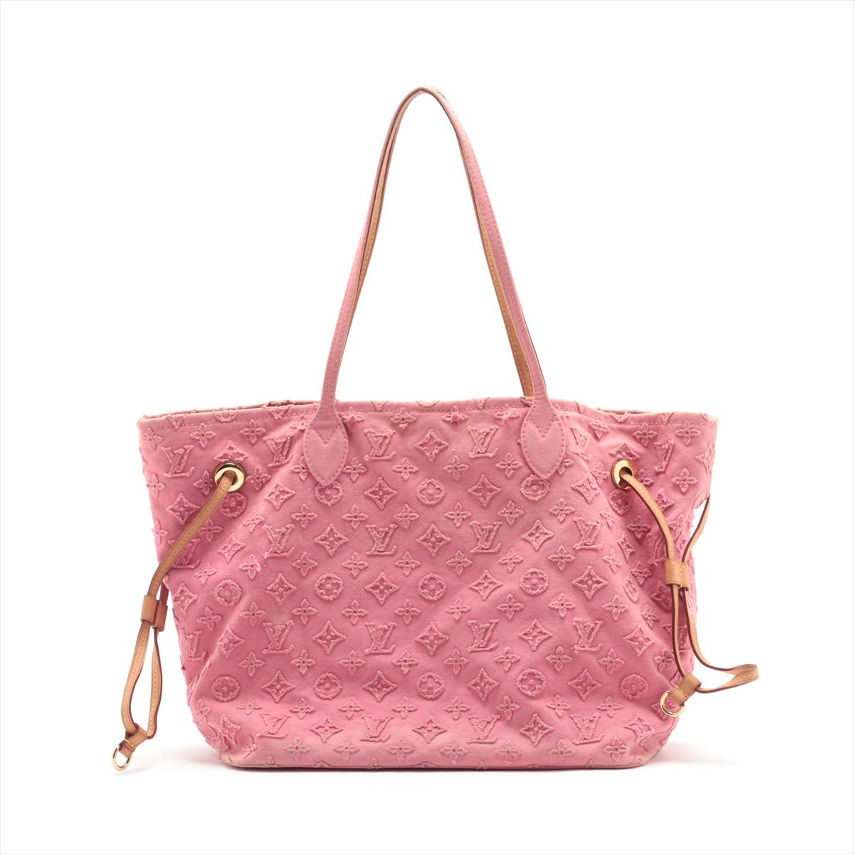 RANK: B

The Louis Vuitton Monogram Denim Applique Neverfull MM in Pink is a distinctive and fashionable variation of the classic Neverfull tote bag. The monogram canvas is complemented by a pink denim material, creating a fresh and contemporary