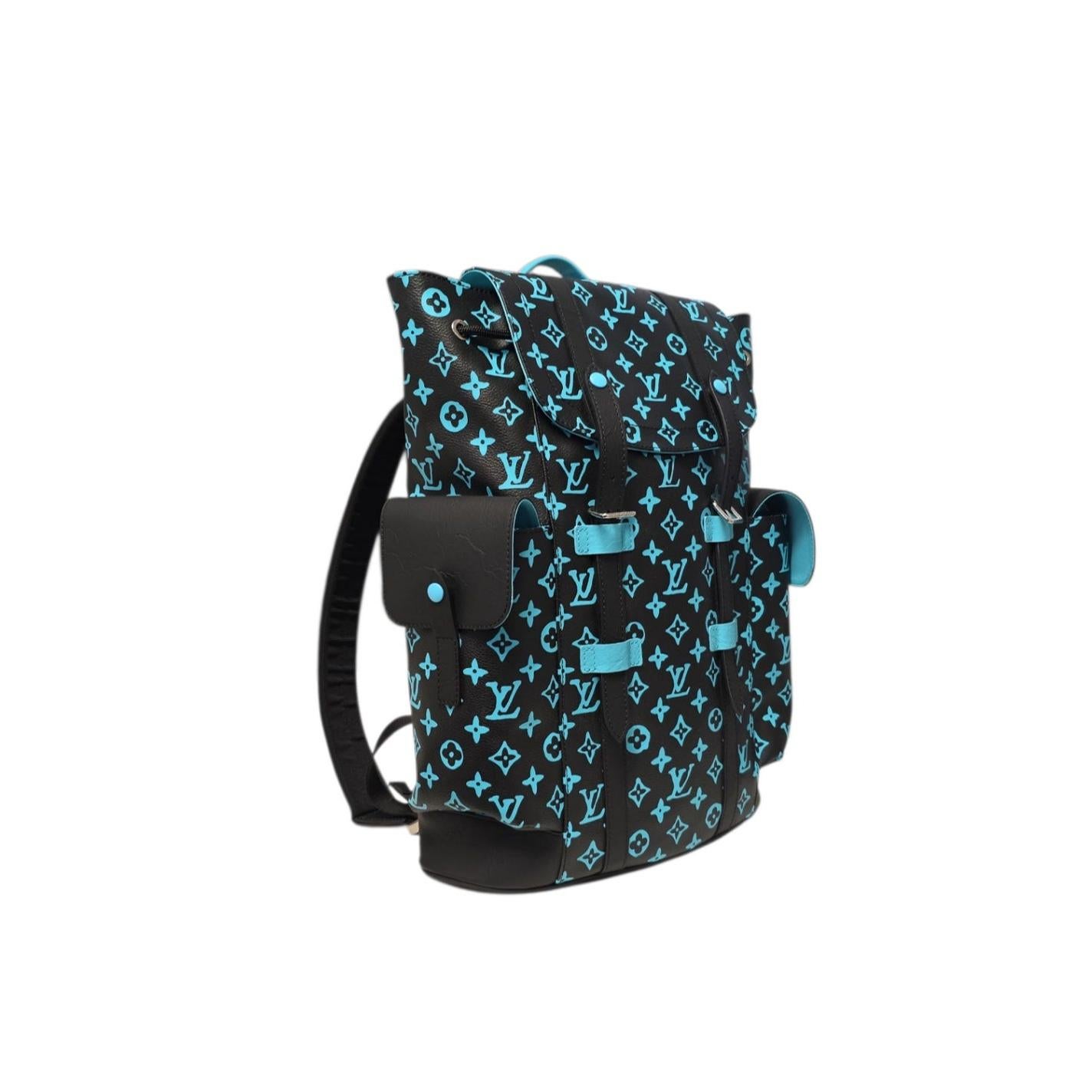 The Christopher MM backpack is made from Monogram Playground coated canvas, with the Monogram pattern printed in a near-neon contrasting color. The treatment gives the Monogram an almost 3-D aspect. Evocative of the hiking pack, the rugged
