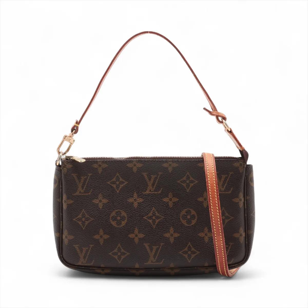 The Louis Vuitton Monogram Pochette Accessoires is a classic and versatile piece crafted from the house’s signature Monogram canvas with natural cowhide leather accents. Its sleek, compact silhouette is complemented by gold-tone hardware and a
