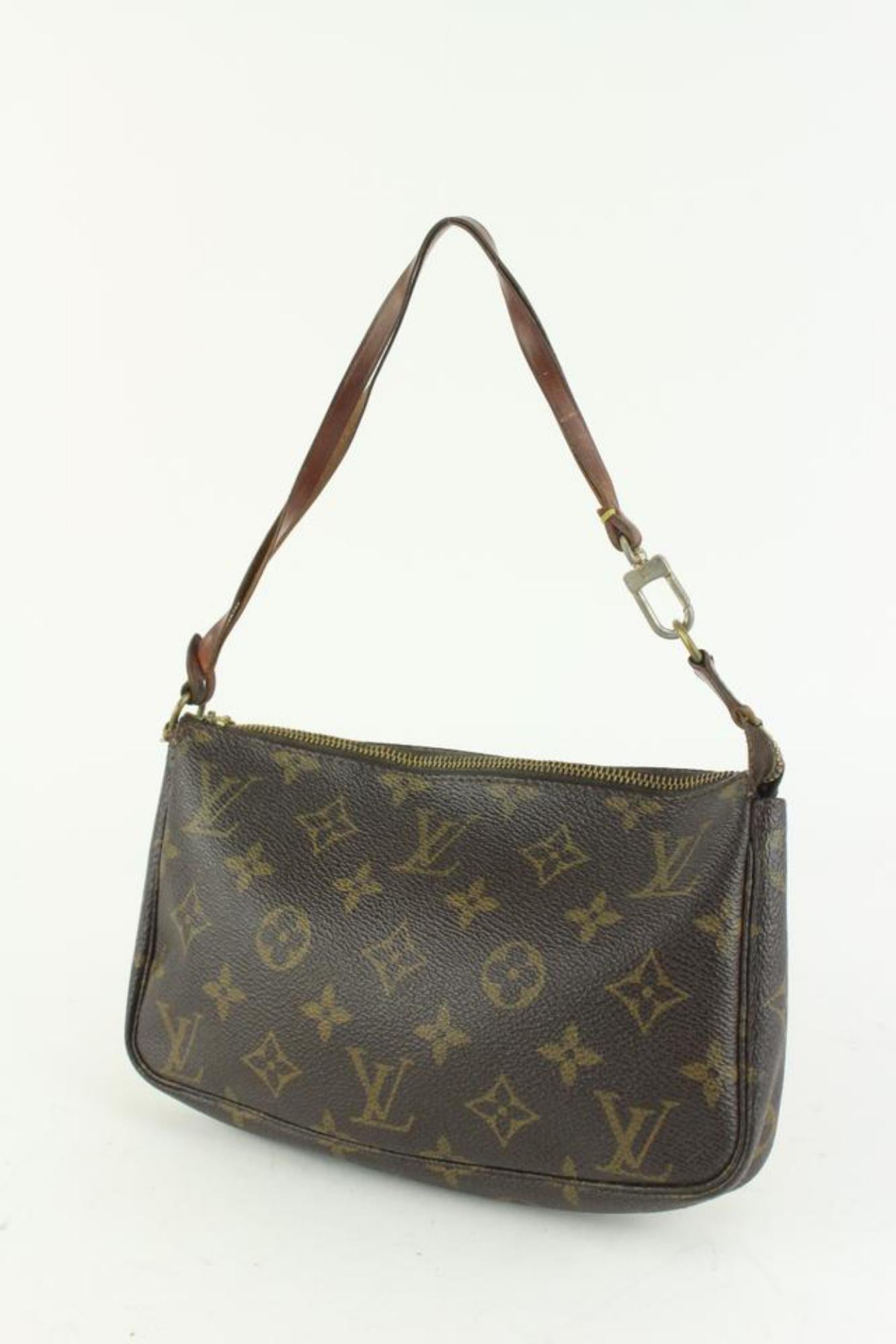 Louis Vuitton Monogram Pochette Accessories Wristlet Pouch 1216lv42
Date Code/Serial Number: AR0070
Made In: France
Measurements: Length:  8.5