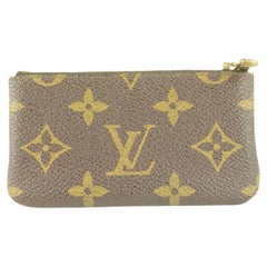 Aesthetic keys and key chain with Louis Vuitton key pouch, puff ball, and  jeweled initial.