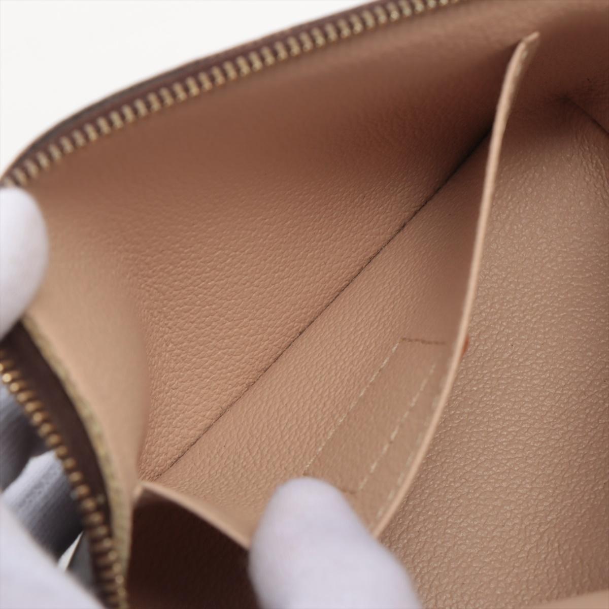 Donna Cosmetico Monogram Pochette Louis Vuitton in vendita
