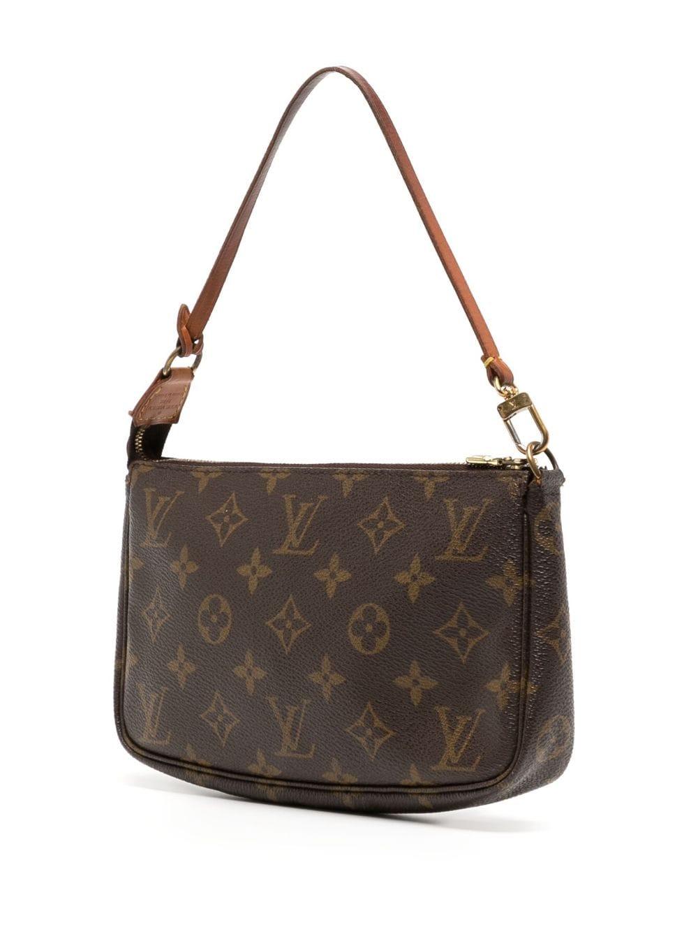 The chicest mini shoulder bag on the market: The Louis Vuitton Pochette Bag. First released in 1992, this timeless bag is made with the iconic canvas monogram print. It is a versatile accessory that can be worn from day to night, providing a stylish