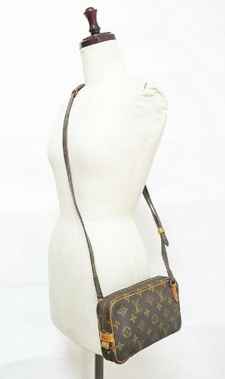Name:LOUIS VUITTON Marly Bandouliere
Made In:France
Code:873 TH (1987 March, France)
Color:Browns
Material:Louis Vuitton monogram canvas and leather.
Features:Adjustable length shoulder strap.
Small, cute and easy to carry.
Size in inches
