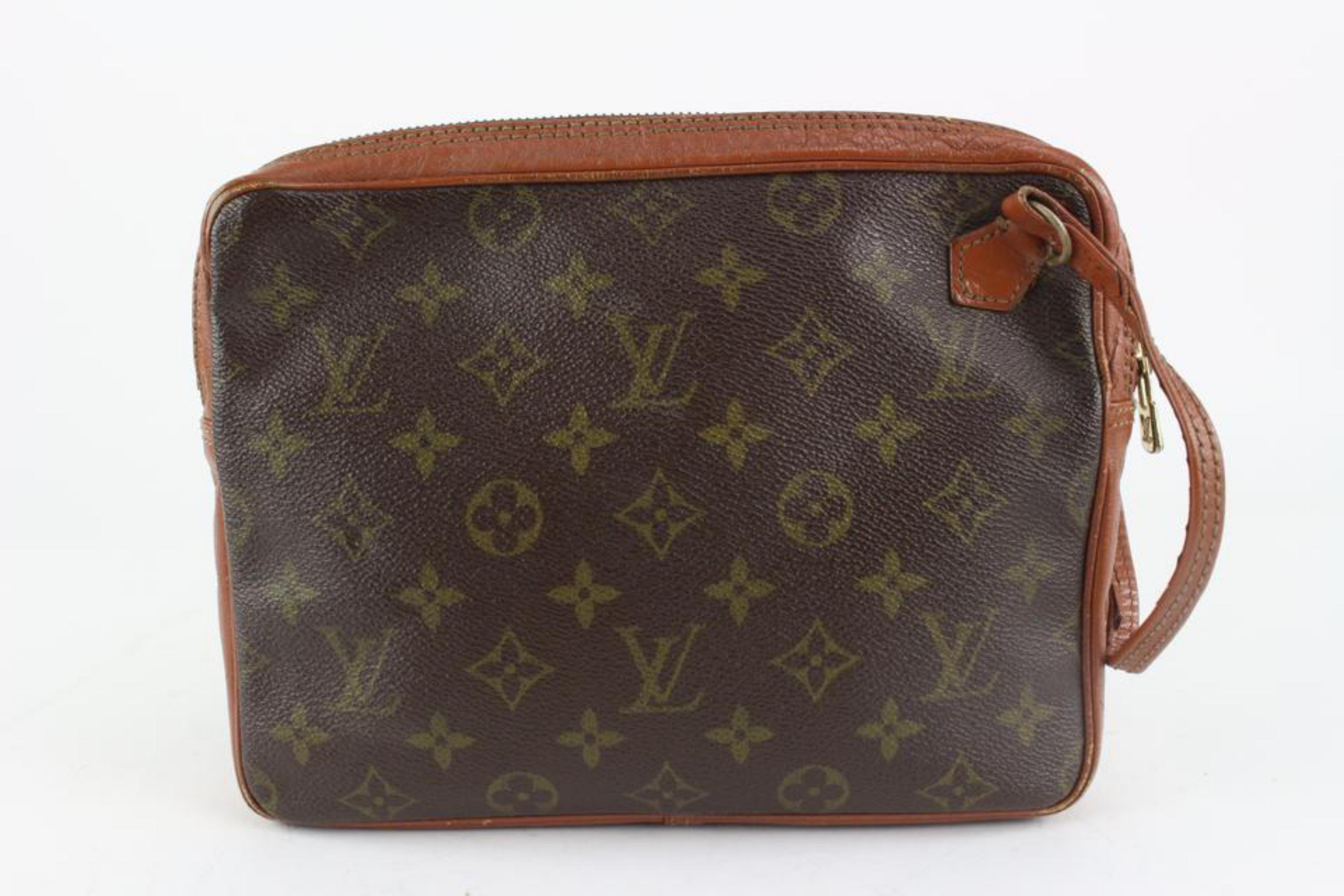 Louis Vuitton Monogram Pochette Marly Dragonne Wristlet Clutch Pouch 1216lv47
Date Code/Serial Number: 822
Made In: France
Measurements: Length:  9.5