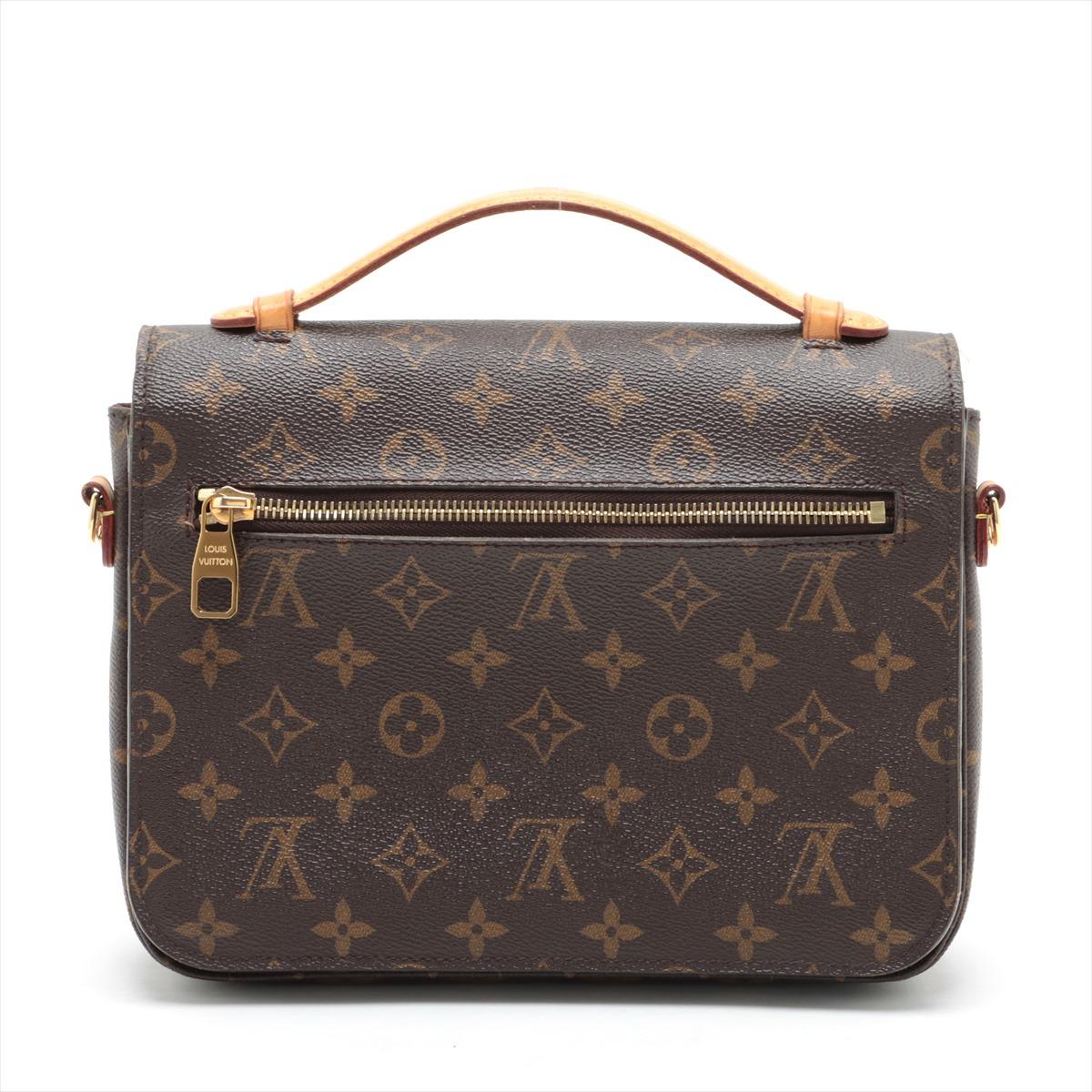 The Louis Vuitton Monogram Pochette Metis MM is a distinctive and coveted handbag that epitomizes the brand's commitment to sophistication and practicality. Impeccably crafted with the iconic Monogram canvas, the medium-sized masterpiece showcases