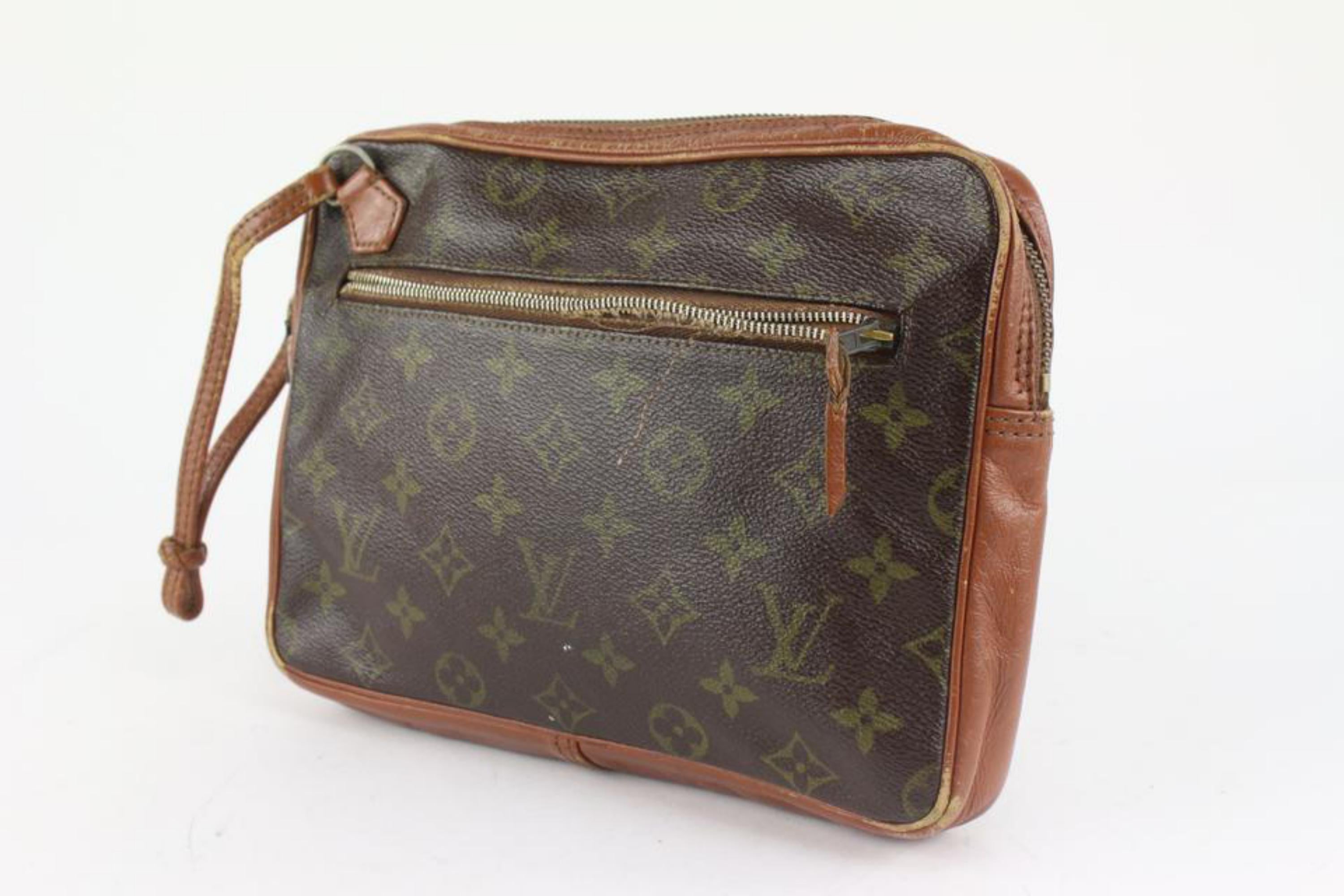 Louis Vuitton Monogram Pochtte Marly Dragonne Wristlet Pouch 1216lv48
Date Code/Serial Number: 871
Made In: France
Measurements: Length:  9.5