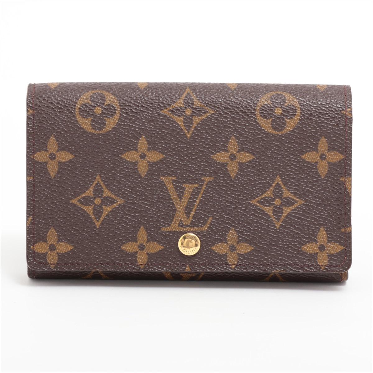 The Louis Vuitton Monogram Porte Monnaie Billets Tresor Wallet is a refined and functional accessory that combines classic elegance with modern practicality. Crafted from Louis Vuitton's iconic Monogram canvas, the wallet showcases the brand's