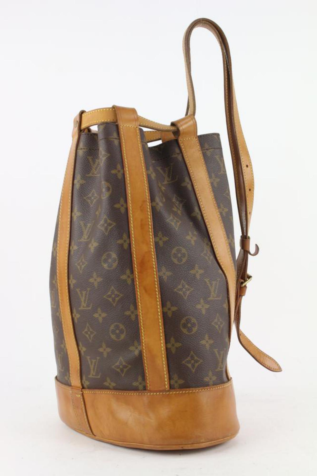 Louis Vuitton Monogram Randonnee PM Drawstring Hobo Sling Backpack Bag 5LZ1109
Date Code/Serial Number: AS 1925
Made In: France
Measurements: Length: 12 