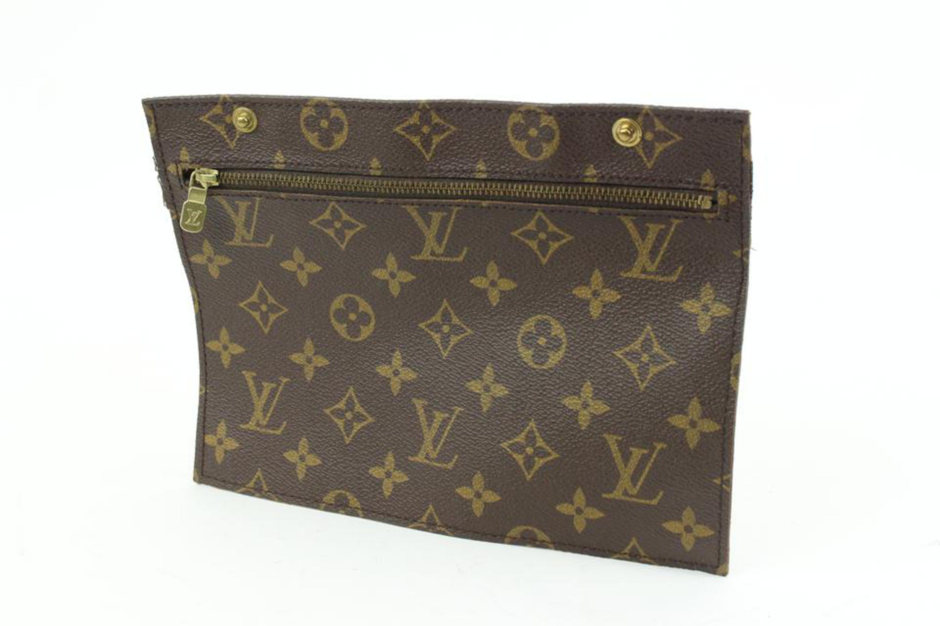 Louis Vuitton Monogrammierte Randonnee Handgelenkstasche mit Intarsien 46LV35
Maße: Länge:  8,75