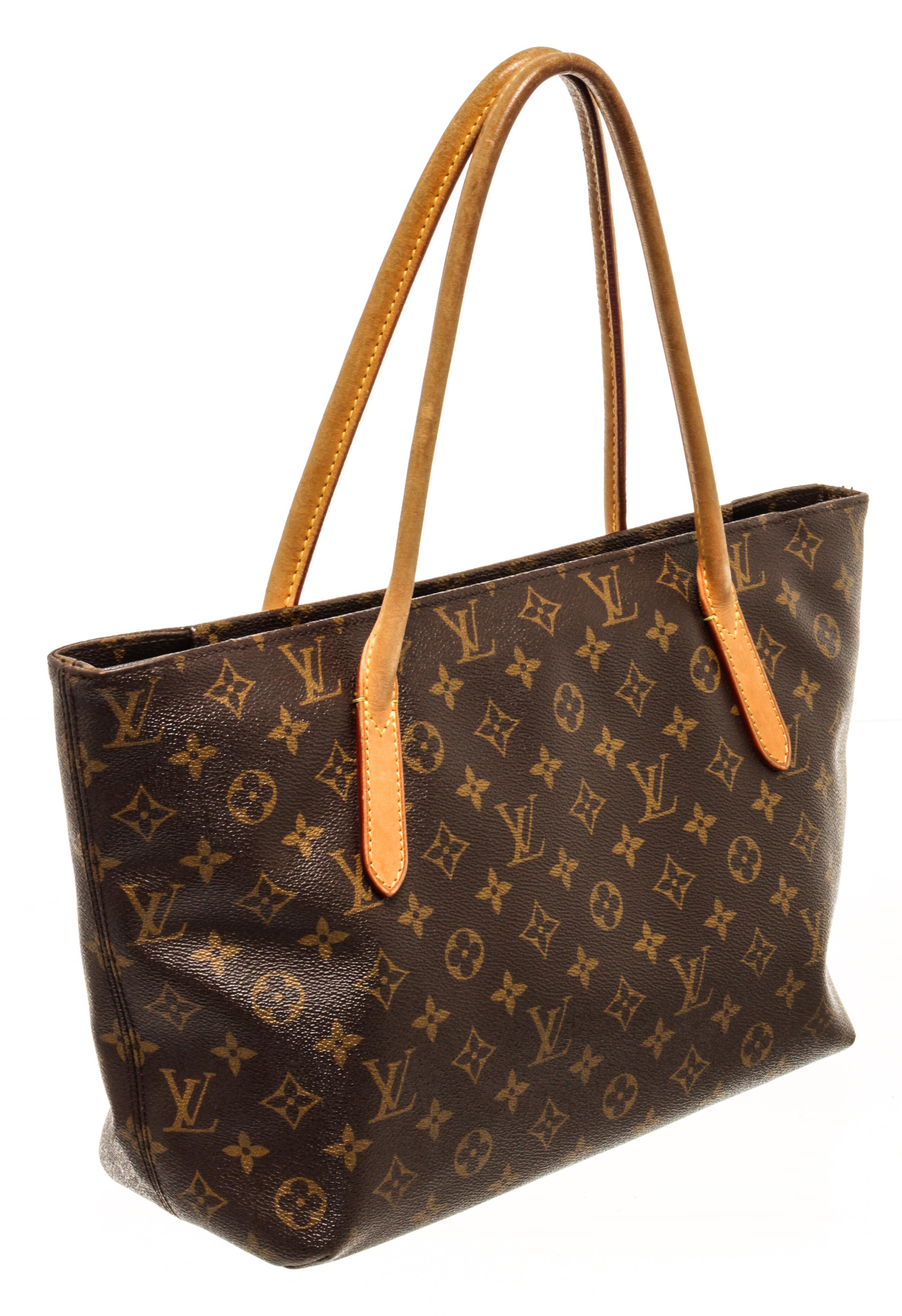 Louis Vuitton Monogram Raspail PM with vachetta top handle, zip closure, red fabric lining, one zip interior pocket, and gold-tone hardware.

80556MSC