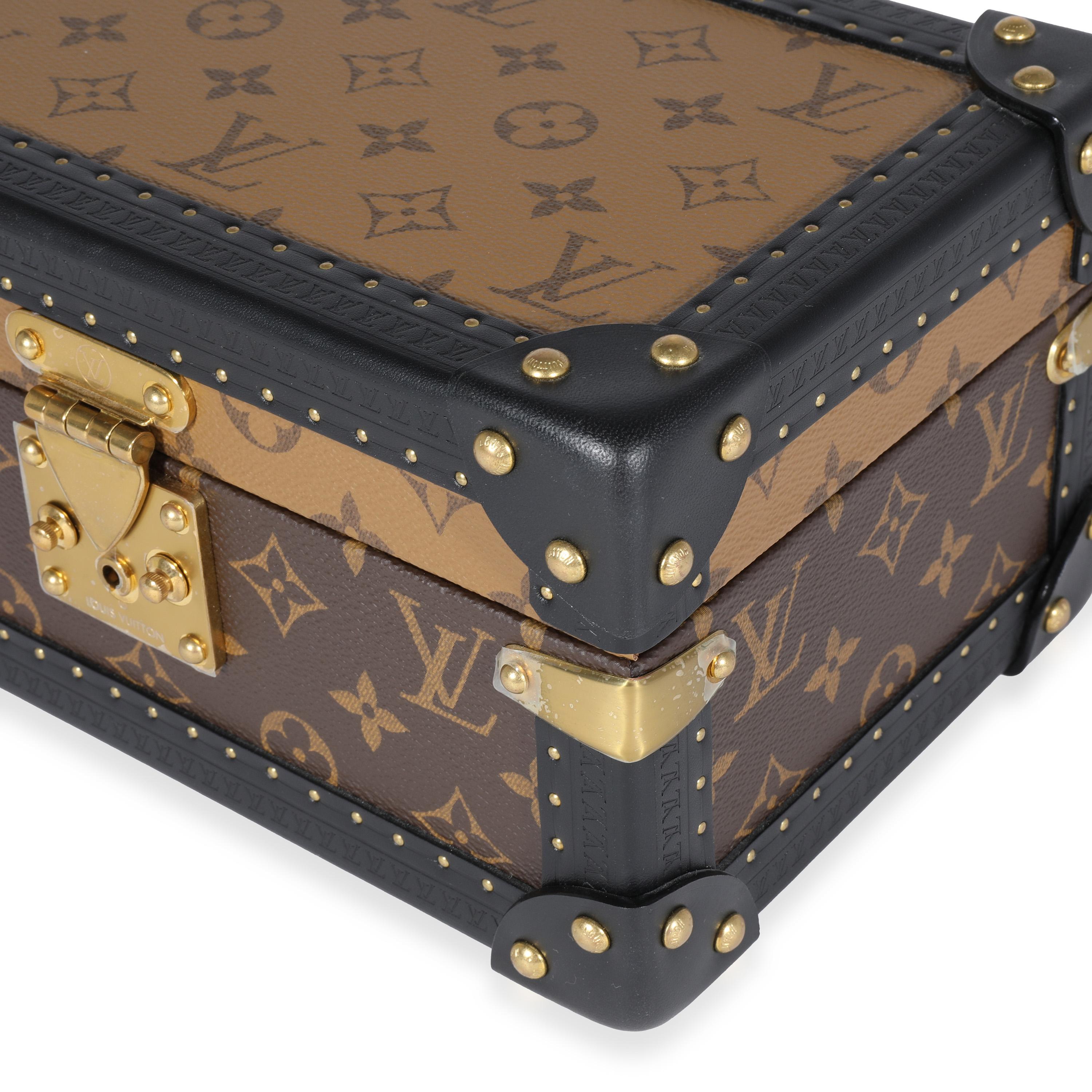 Listing Title: Louis Vuitton Monogram Reverse Canvas Coffret Tresor 24
SKU: 121902
MSRP: 5300.00
Condition: Pre-owned 
Handbag Condition: Very Good
Condition Comments: Very Good Condition. Some plastic at hardware. Minor scuffing at exterior. Minor